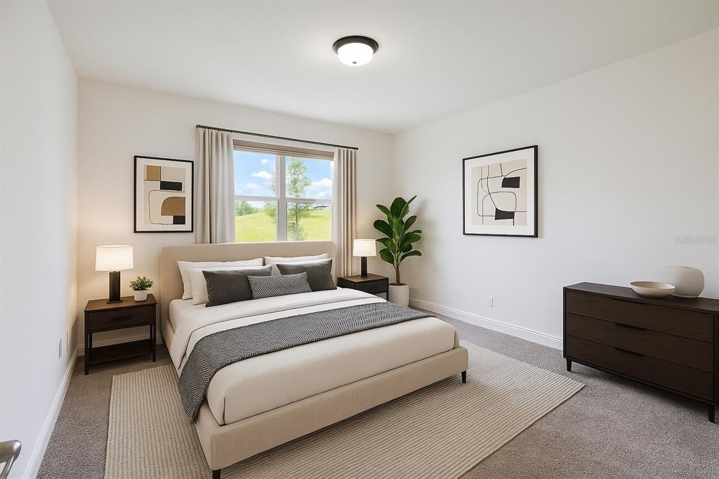 1193 Cavender Creek Road Minneola, FL 34715 - Photo 4 of 22 a bedroom with a large bed and a window