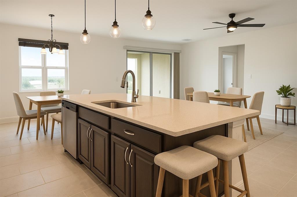 1193 Cavender Creek Road Minneola, FL 34715 - Photo 9 of 22 a kitchen with a table chairs sink and cabinets