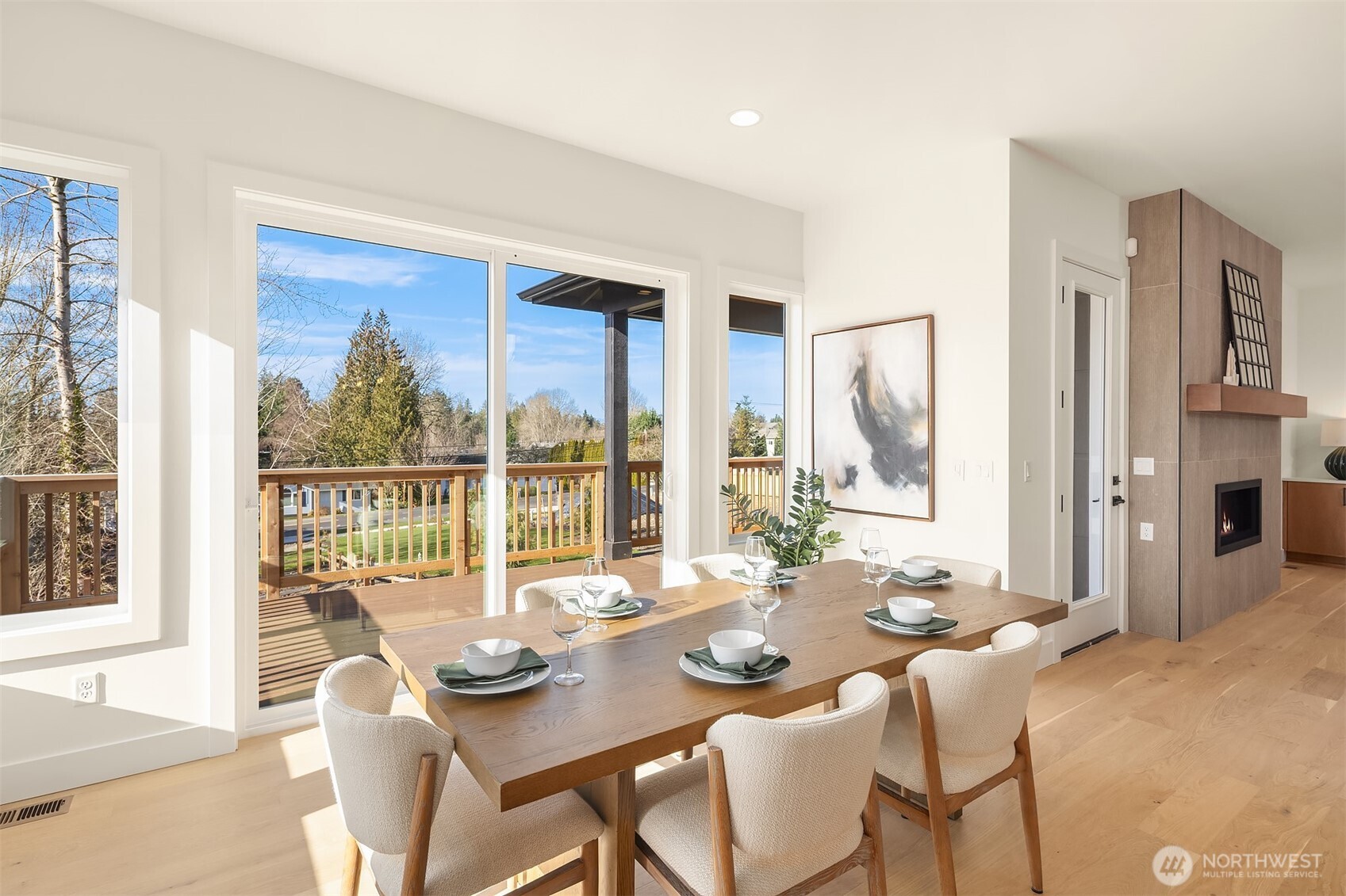 510 Nile Avenue Northeast Renton, WA 98059 - Photo 11 of 40 a dining room with furniture a large window and dining table