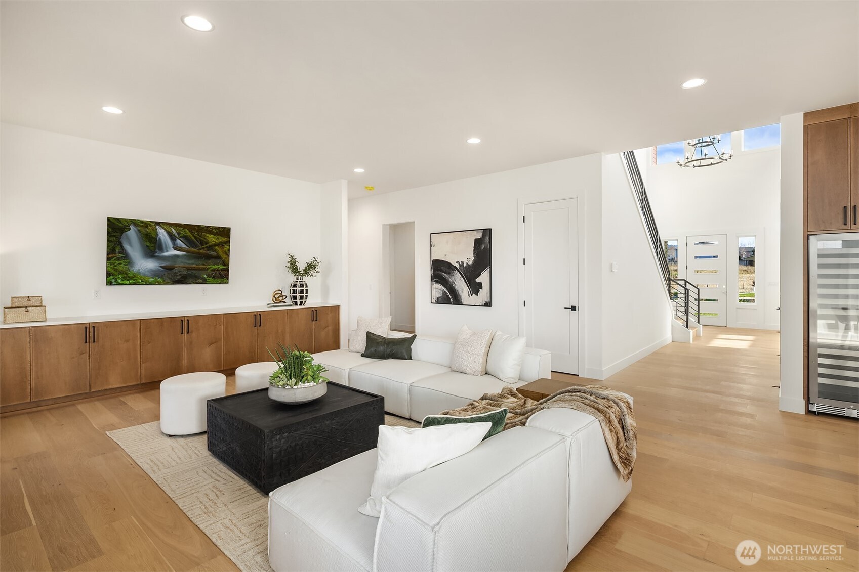 510 Nile Avenue Northeast Renton, WA 98059 - Photo 16 of 40 a living room with furniture and a wooden floor