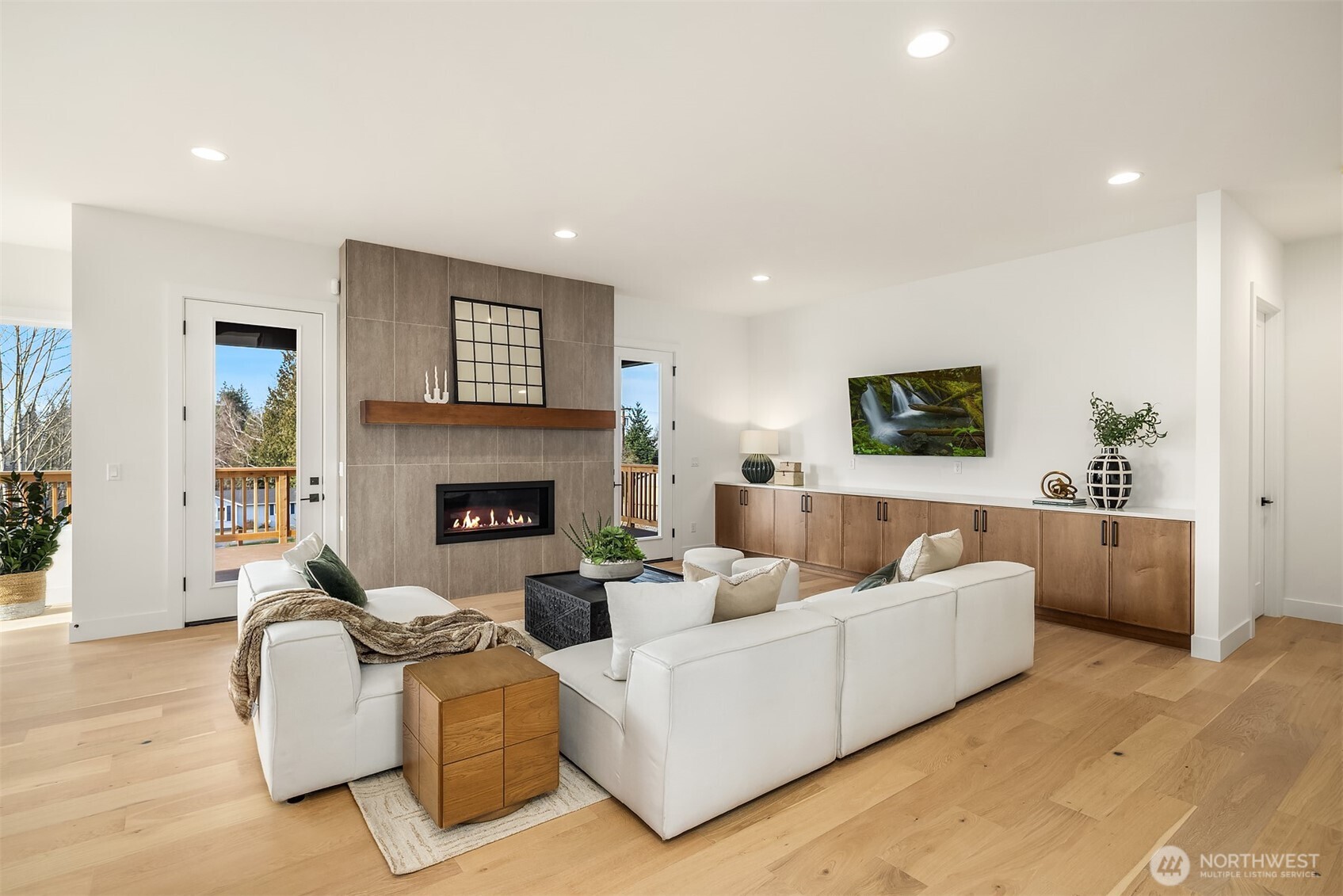 510 Nile Avenue Northeast Renton, WA 98059 - Photo 17 of 40 a living room with furniture and a fireplace