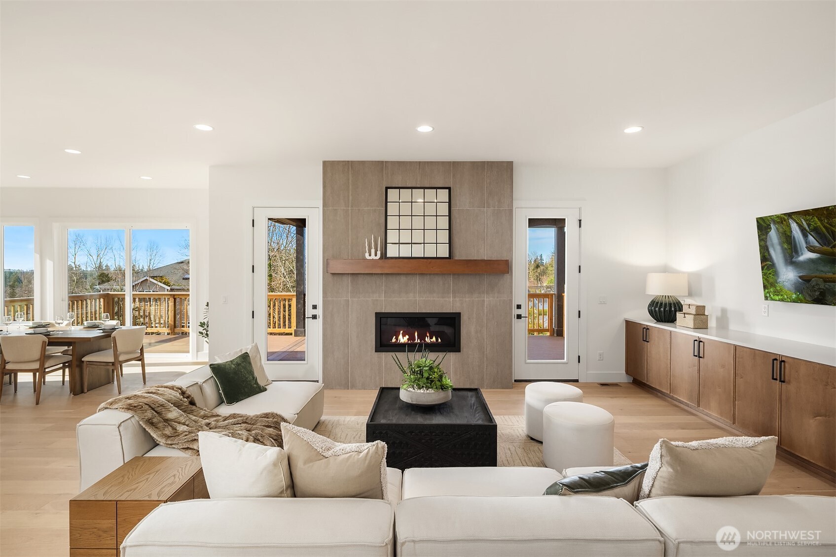 510 Nile Avenue Northeast Renton, WA 98059 - Photo 18 of 40 a living room with furniture and a fireplace