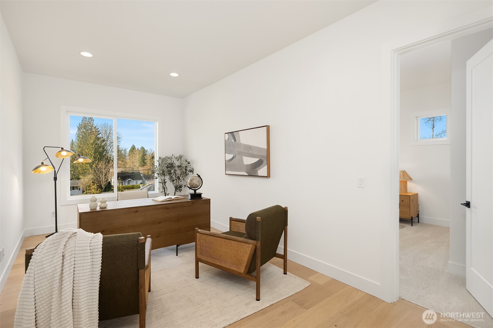 510 Nile Avenue Northeast Renton, WA 98059 - Photo 22 of 40 a living room with furniture and a large window