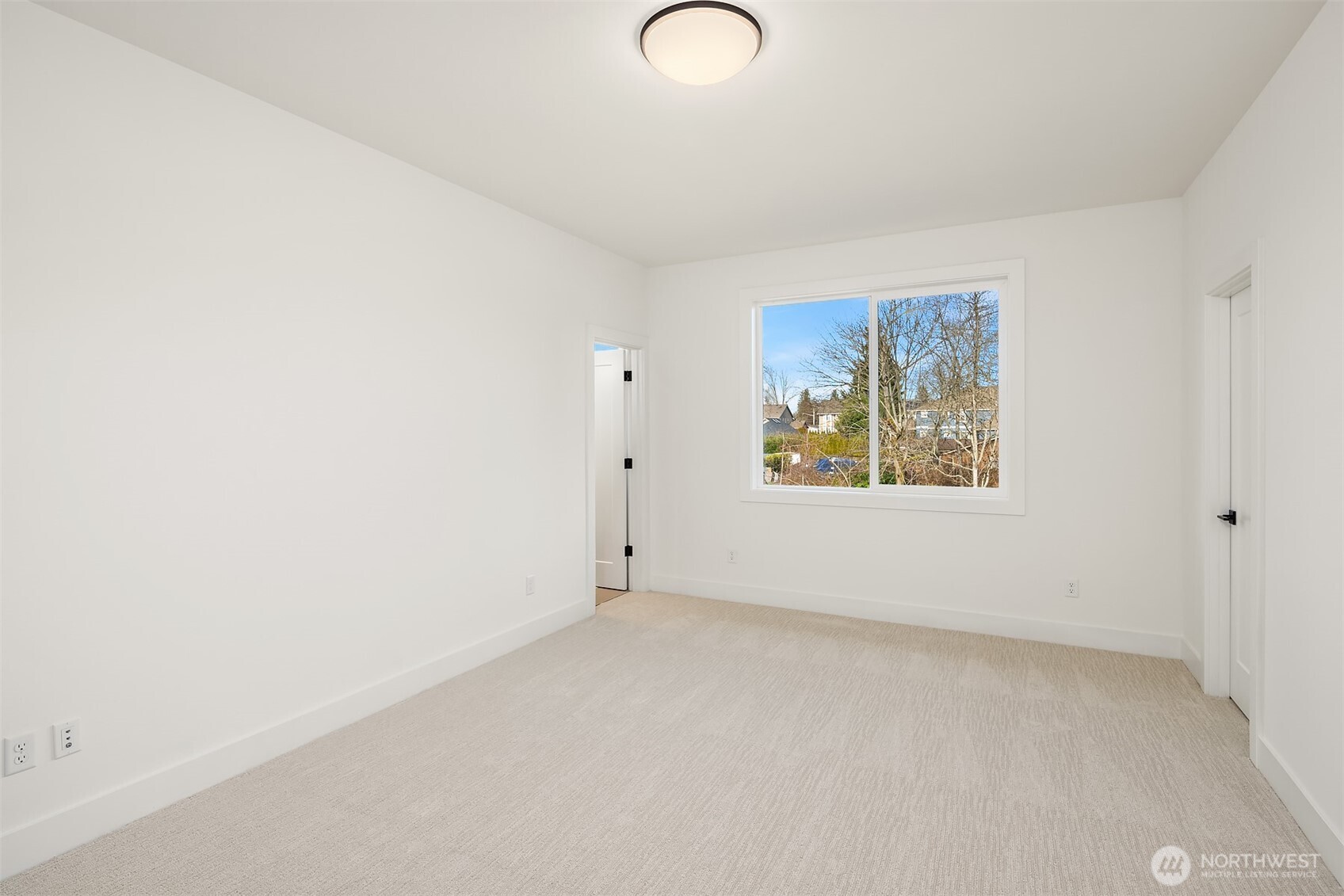 510 Nile Avenue Northeast Renton, WA 98059 - Photo 27 of 40 an empty room with windows