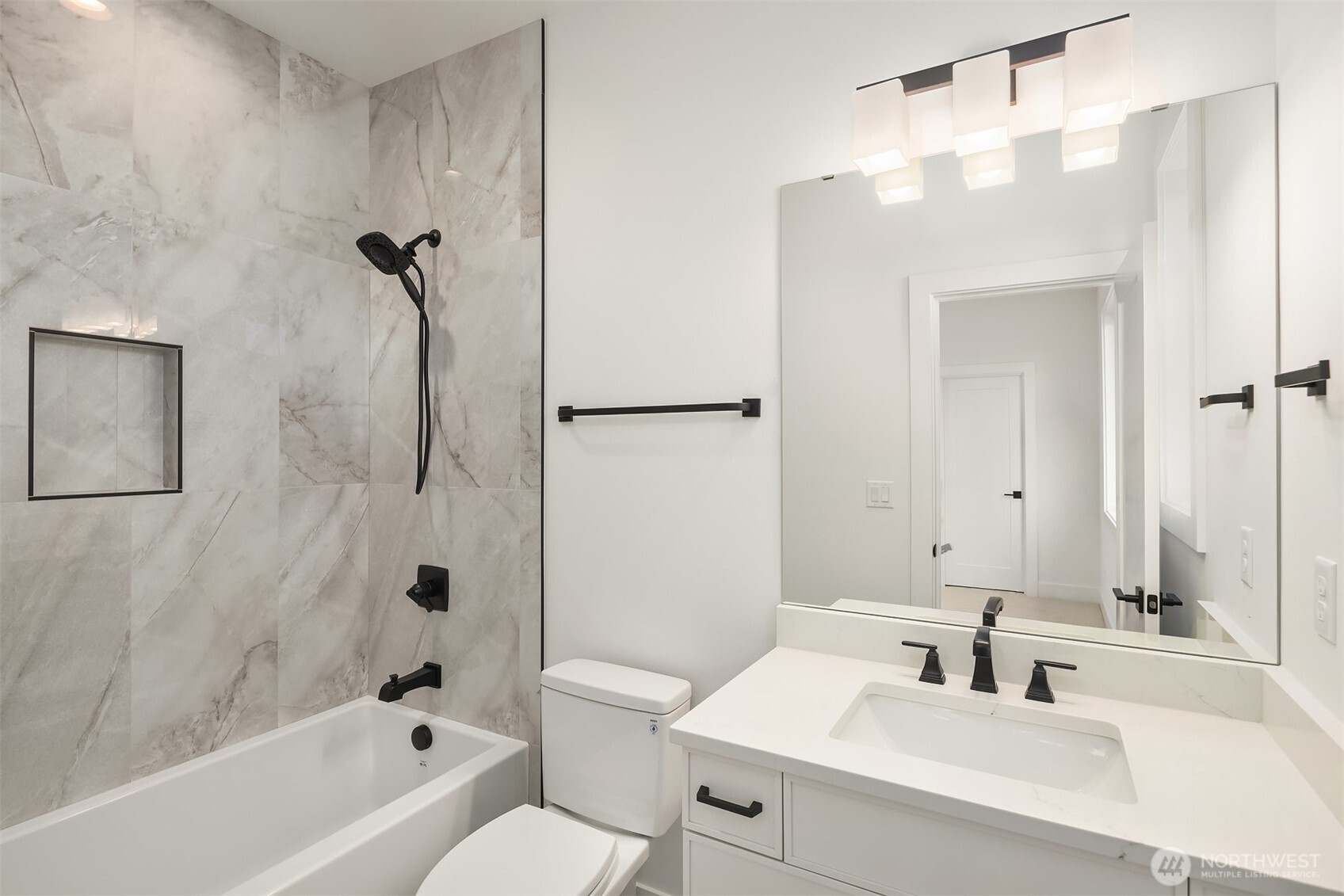 510 Nile Avenue Northeast Renton, WA 98059 - Photo 28 of 40 a bathroom with a sink toilet and shower