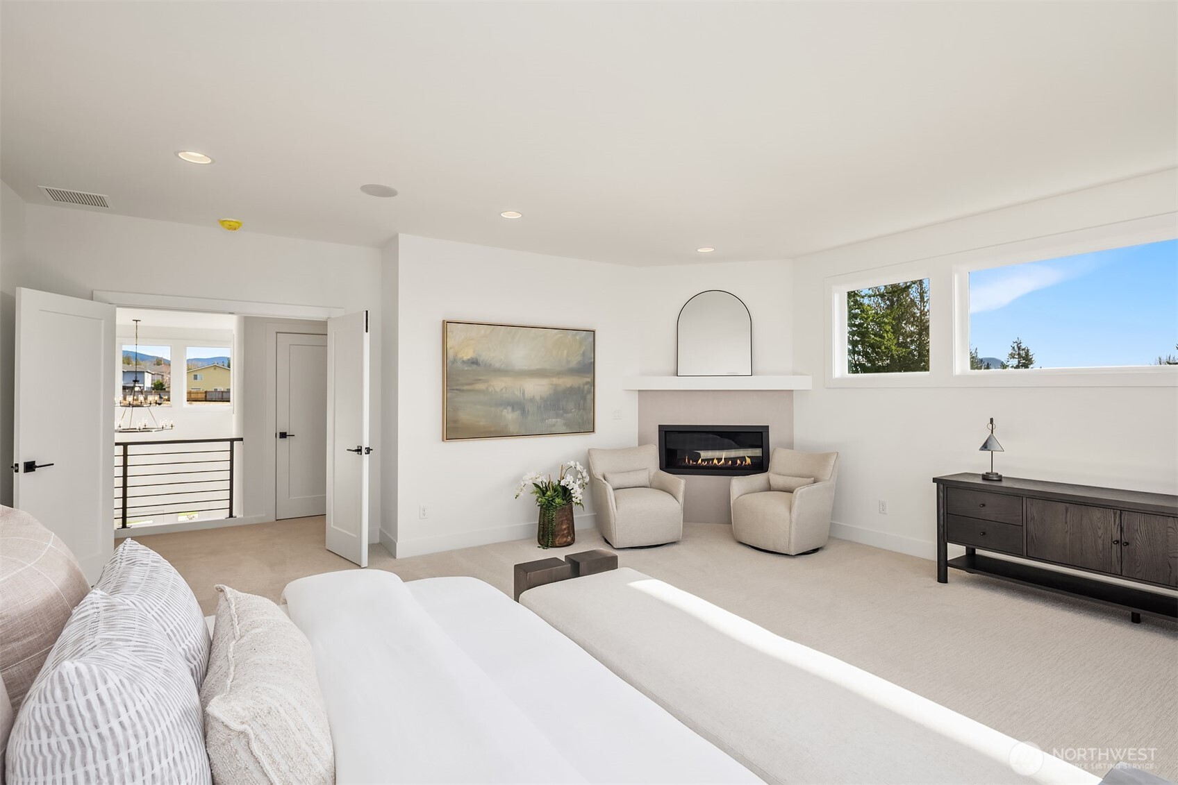 510 Nile Avenue Northeast Renton, WA 98059 - Photo 31 of 40 a bedroom with furniture and a fireplace