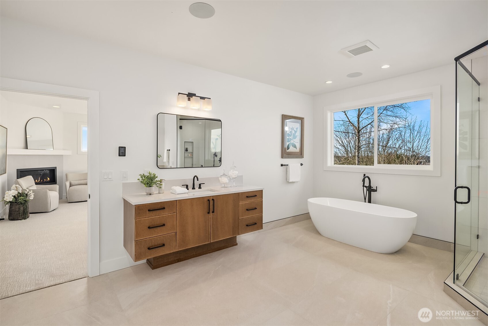510 Nile Avenue Northeast Renton, WA 98059 - Photo 34 of 40 a bathroom with a sink mirror and tub