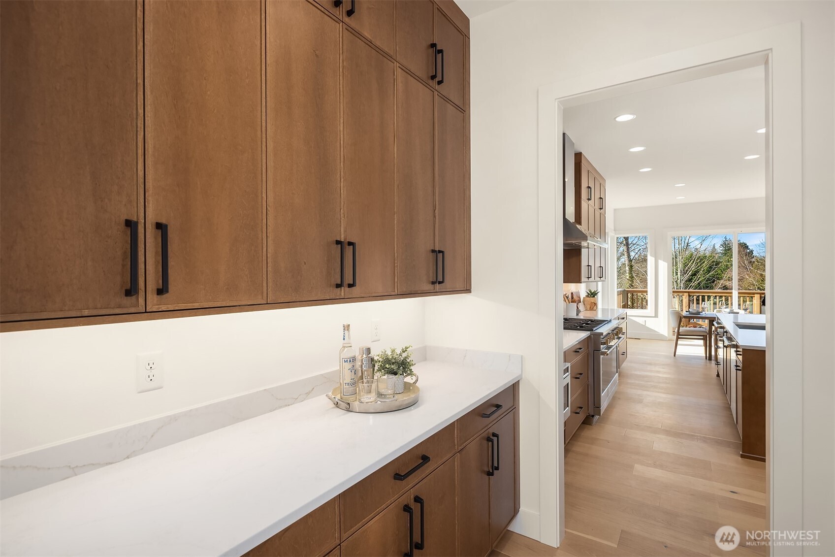 510 Nile Avenue Northeast Renton, WA 98059 - Photo 5 of 40 a bathroom with a sink a mirror and a bathtub
