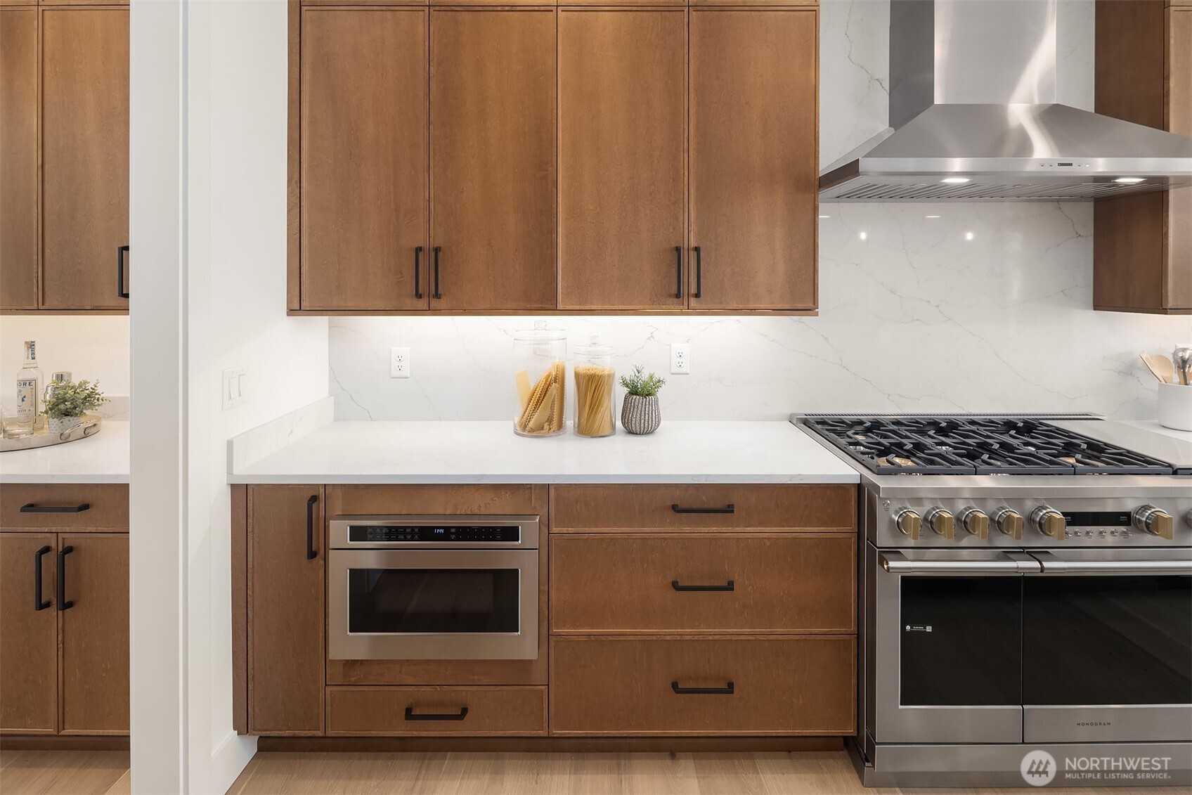 510 Nile Avenue Northeast Renton, WA 98059 - Photo 9 of 40 a stove top oven sitting inside of a kitchen