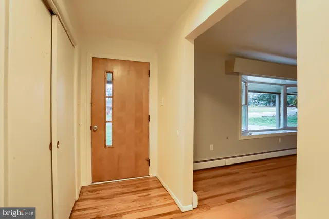 a kitchen with a stove sink and refrigerator