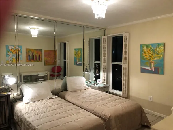 a view of a bathroom from a hallway