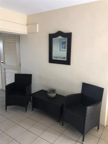 a close up of a wall with a painting on it