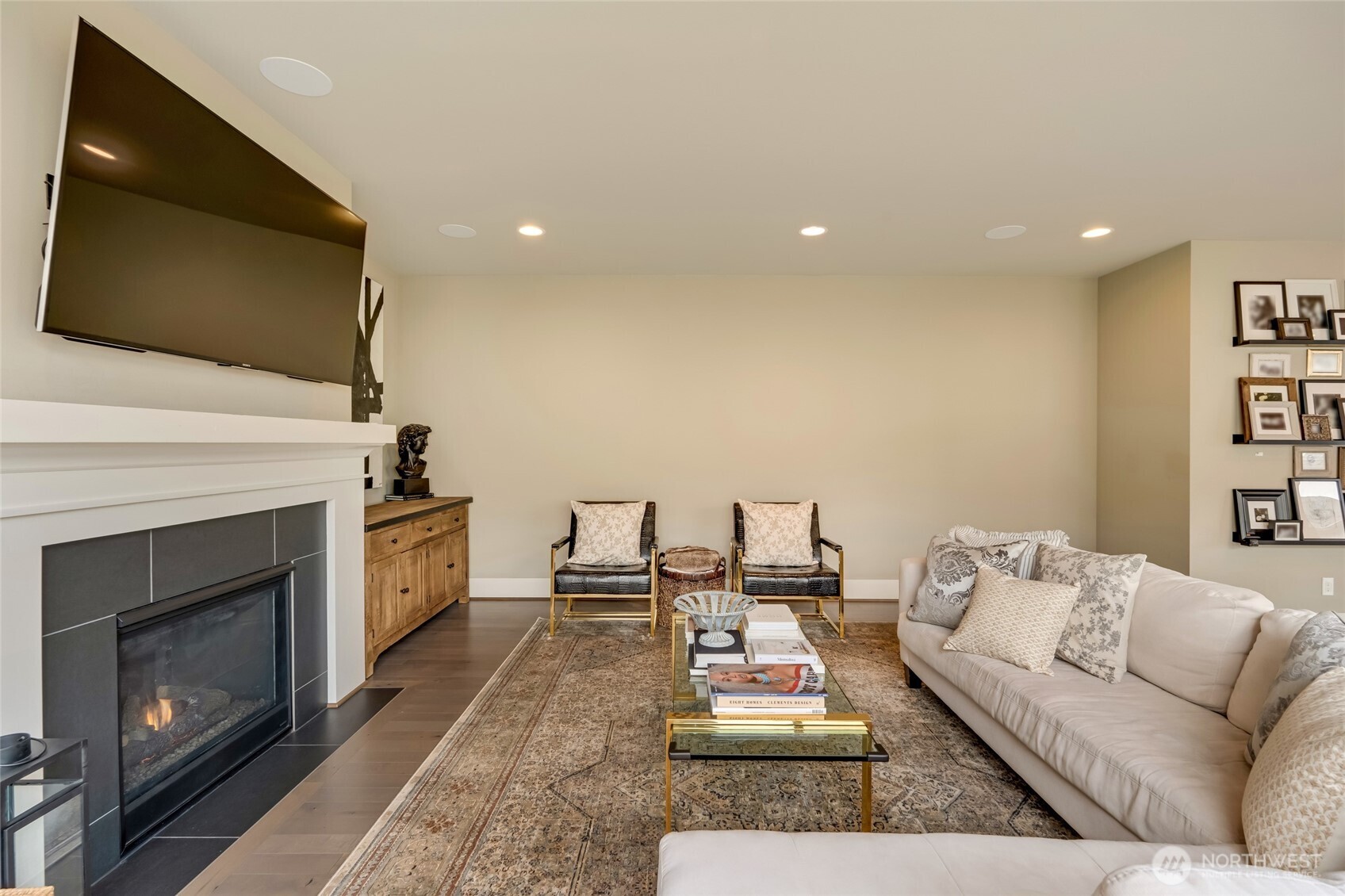 619 Graham Avenue Northeast Renton, WA 98059 - Photo 17 of 40 a living room with furniture and a fireplace