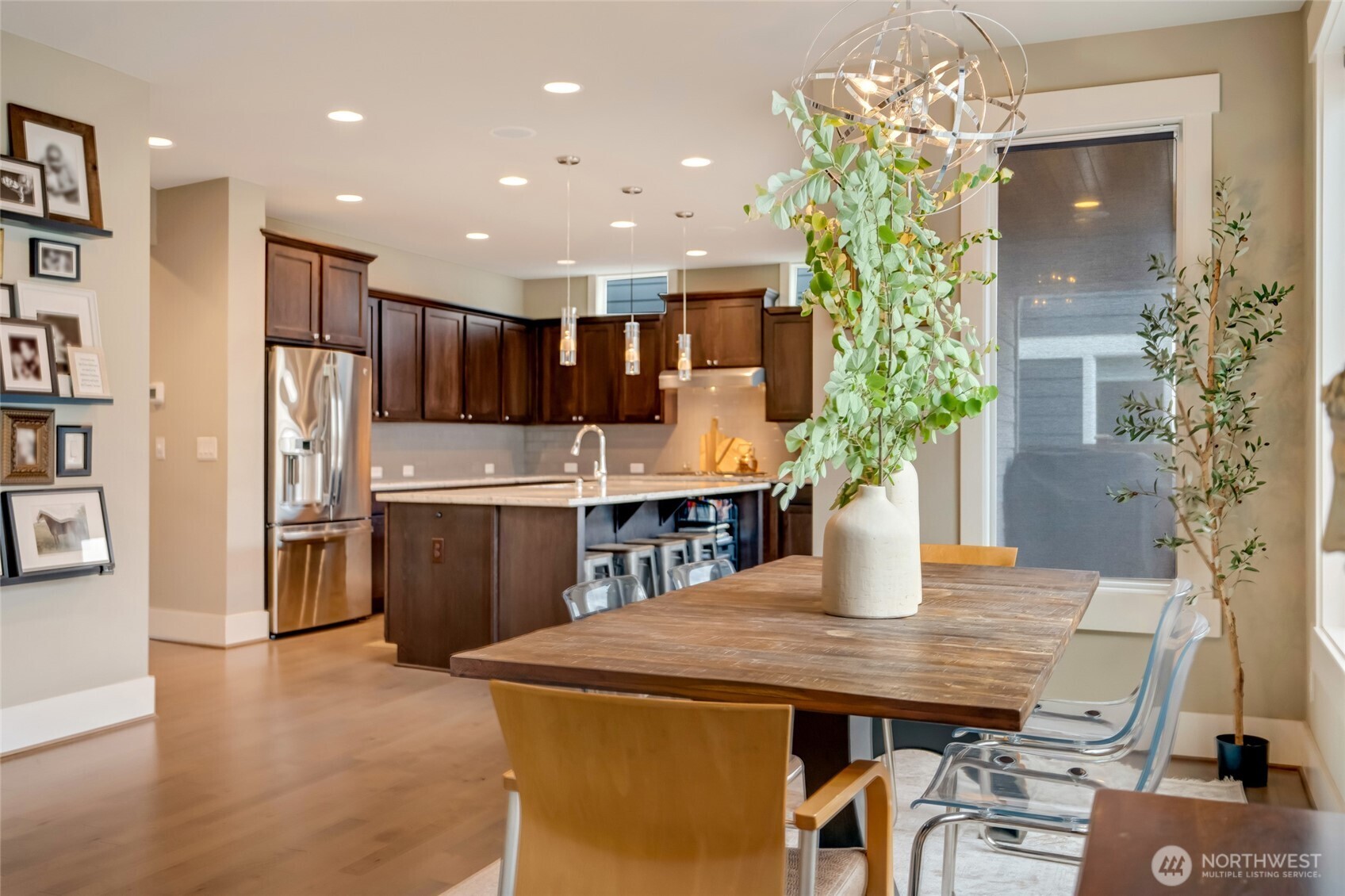 619 Graham Avenue Northeast Renton, WA 98059 - Photo 19 of 40 a kitchen with a table and chairs in it