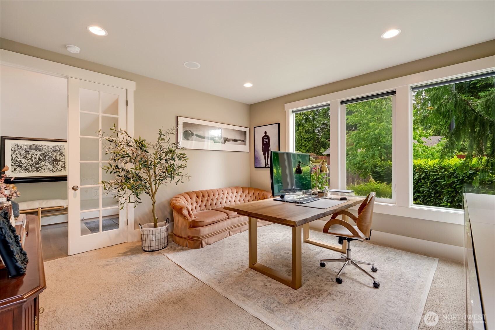 619 Graham Avenue Northeast Renton, WA 98059 - Photo 20 of 40 a living room with furniture a large window and a table