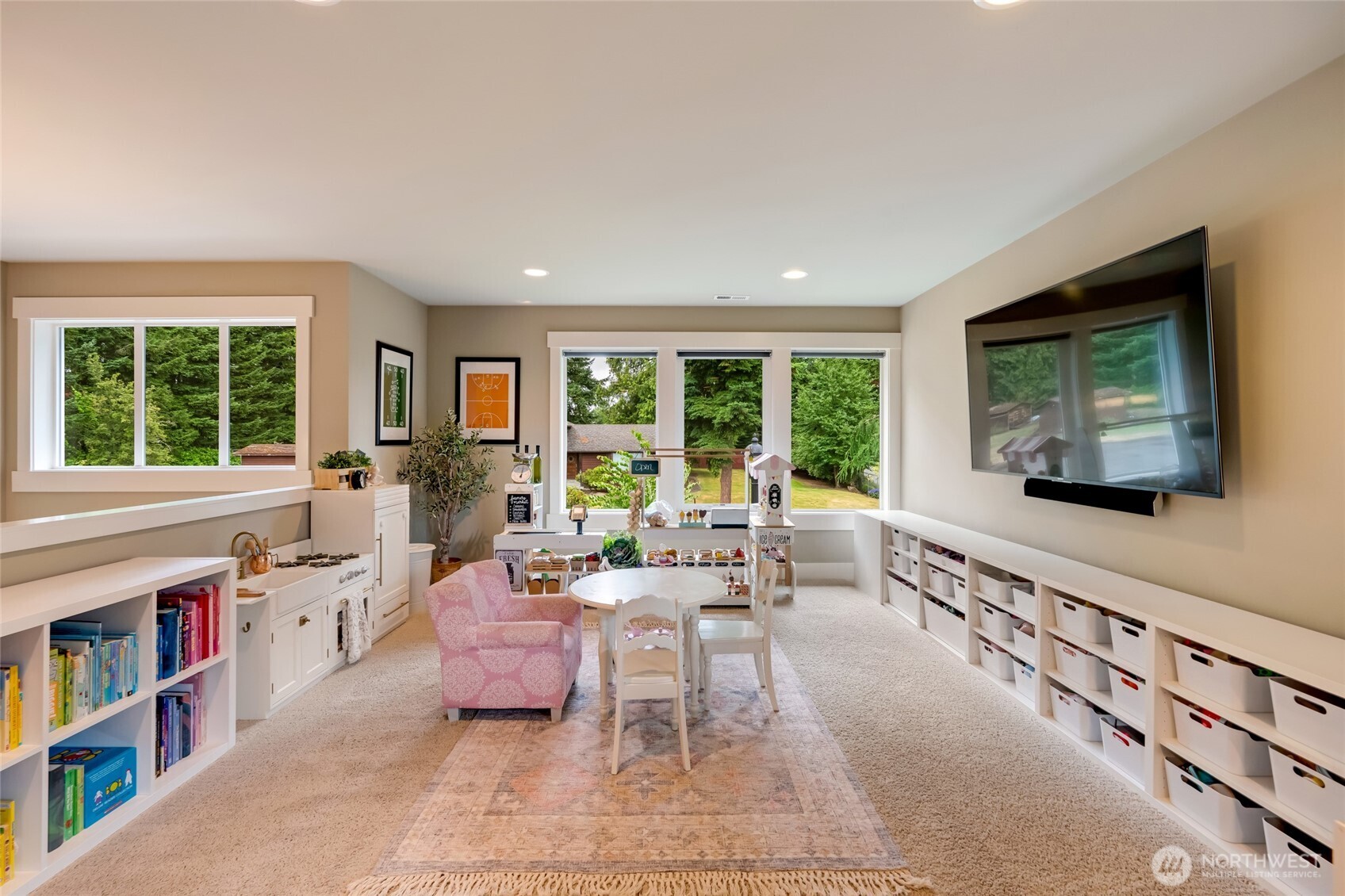 619 Graham Avenue Northeast Renton, WA 98059 - Photo 23 of 40 a living room with furniture and a flat screen tv