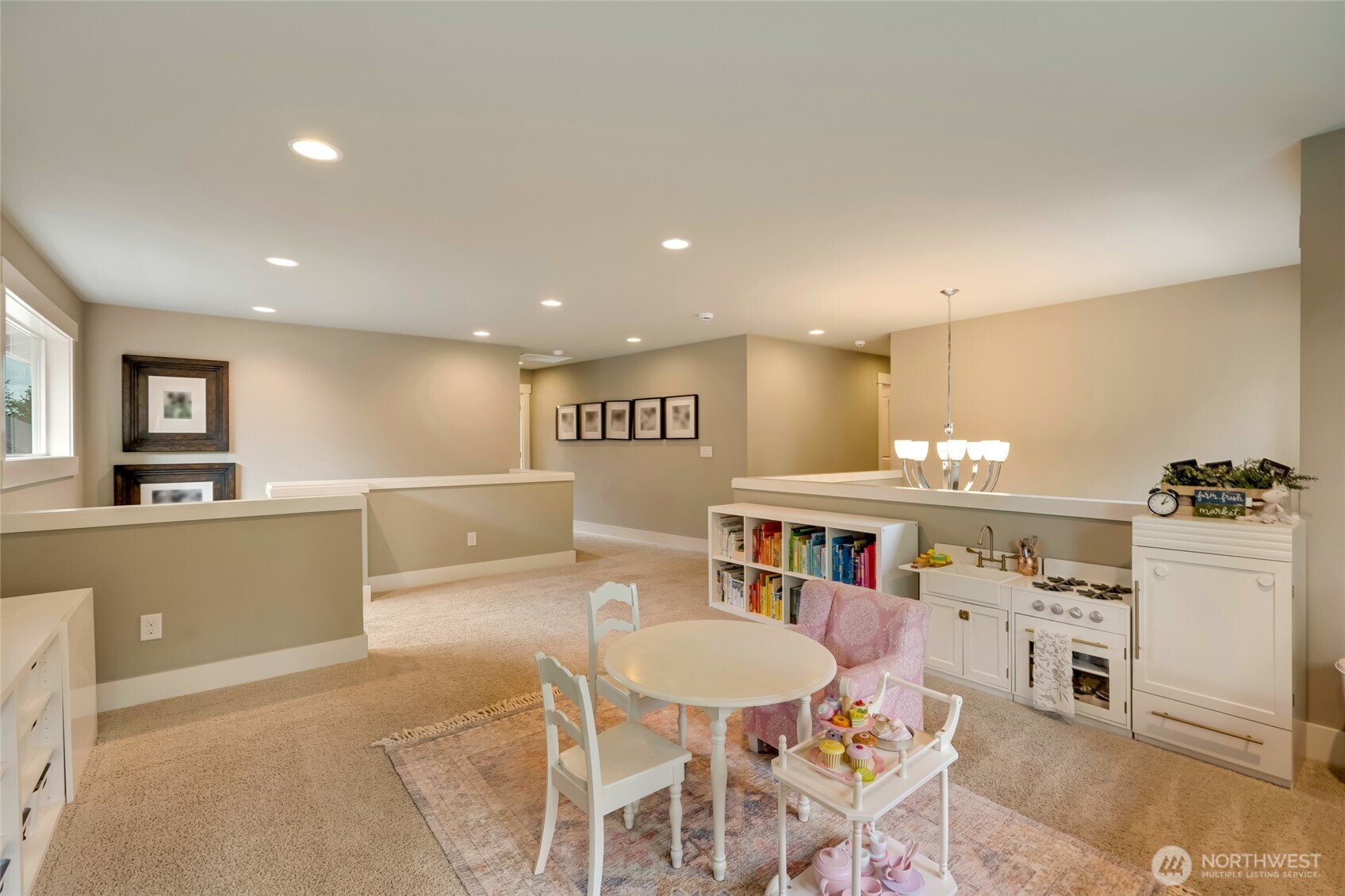 619 Graham Avenue Northeast Renton, WA 98059 - Photo 24 of 40 a kitchen with stainless steel appliances kitchen island granite countertop a sink and cabinets