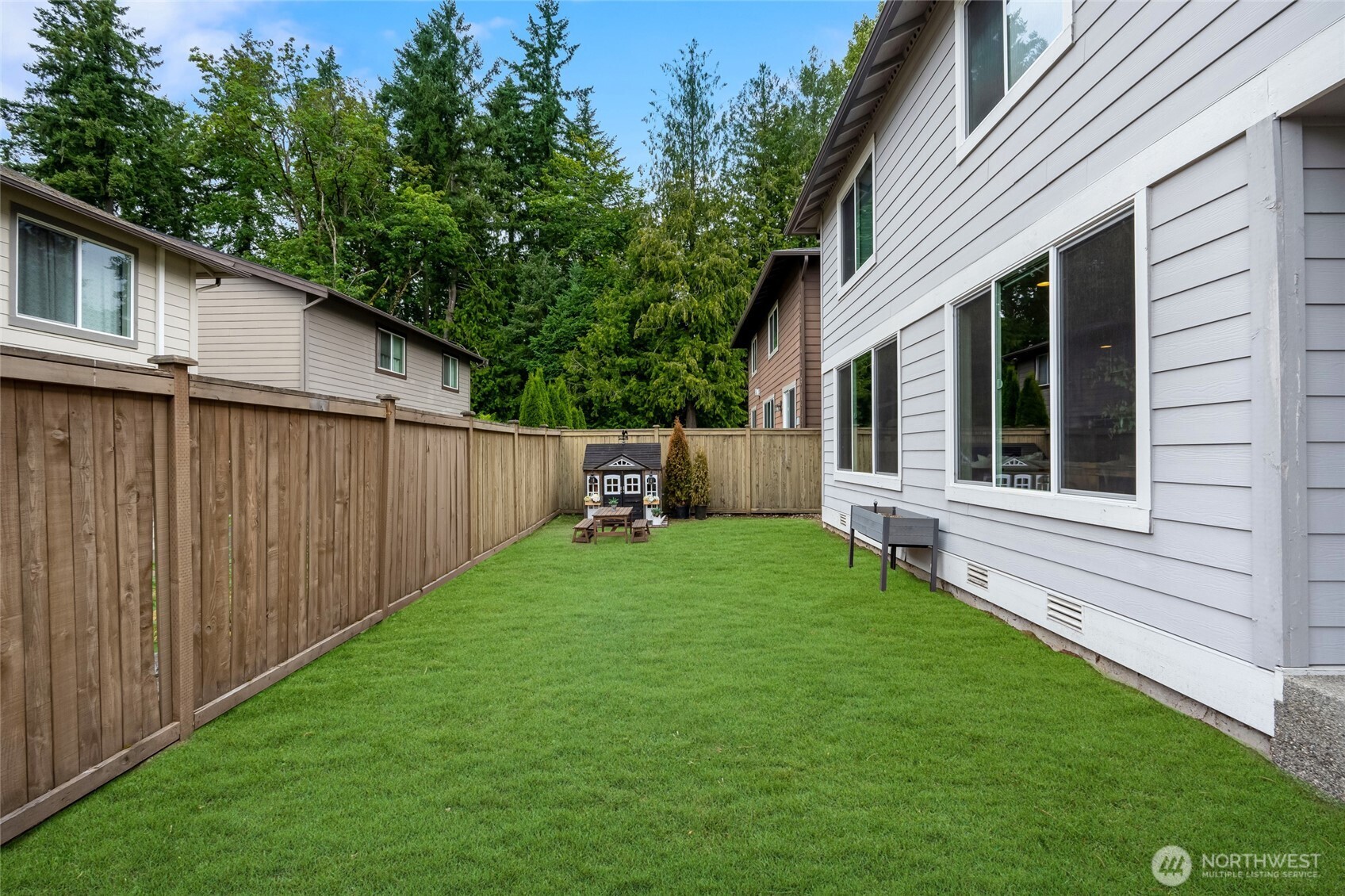 619 Graham Avenue Northeast Renton, WA 98059 - Photo 39 of 40 a view of back yard of the house