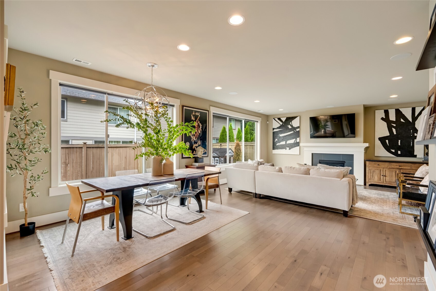 619 Graham Avenue Northeast Renton, WA 98059 - Photo 10 of 40 a living room with furniture fireplace and a table