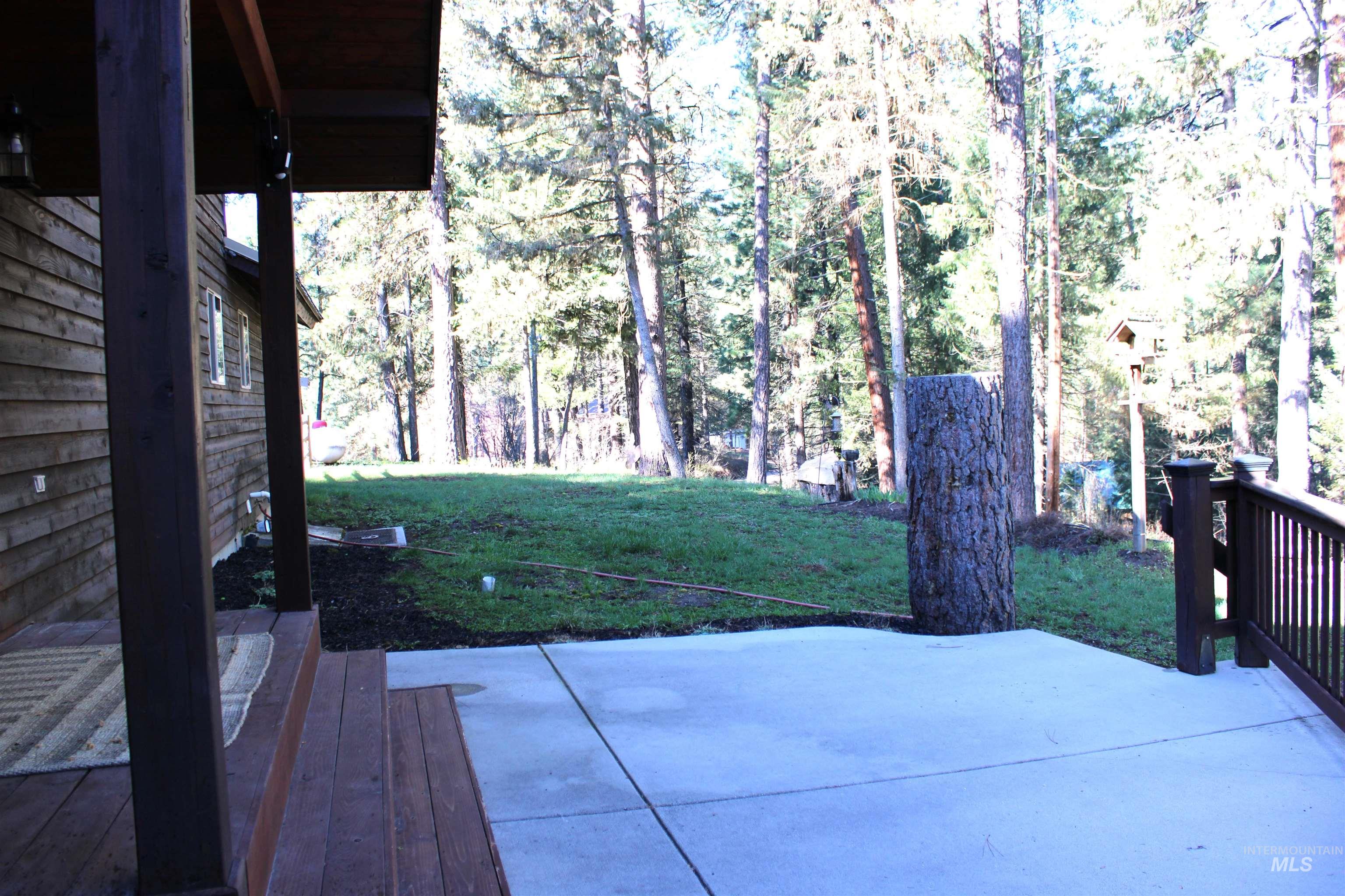 31 Rainbow Ridge Road Garden Valley, ID 83622 - Photo 3 of 33 Front door with lawn and a patio area