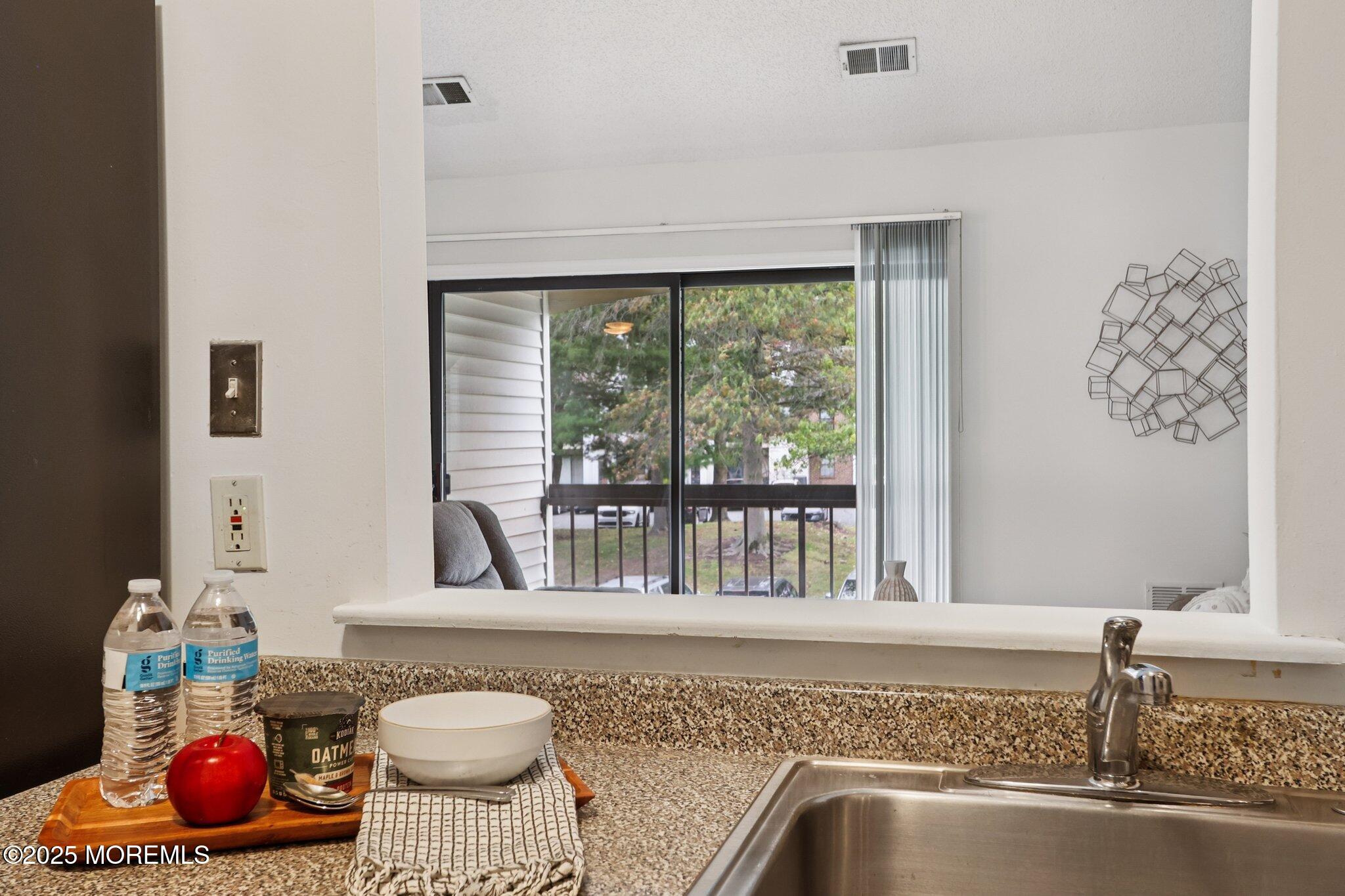 3015 Lighthouse Lane, Unit 3015 Parlin, NJ 08859 - Photo 14 of 22 a living room with a couch and a table