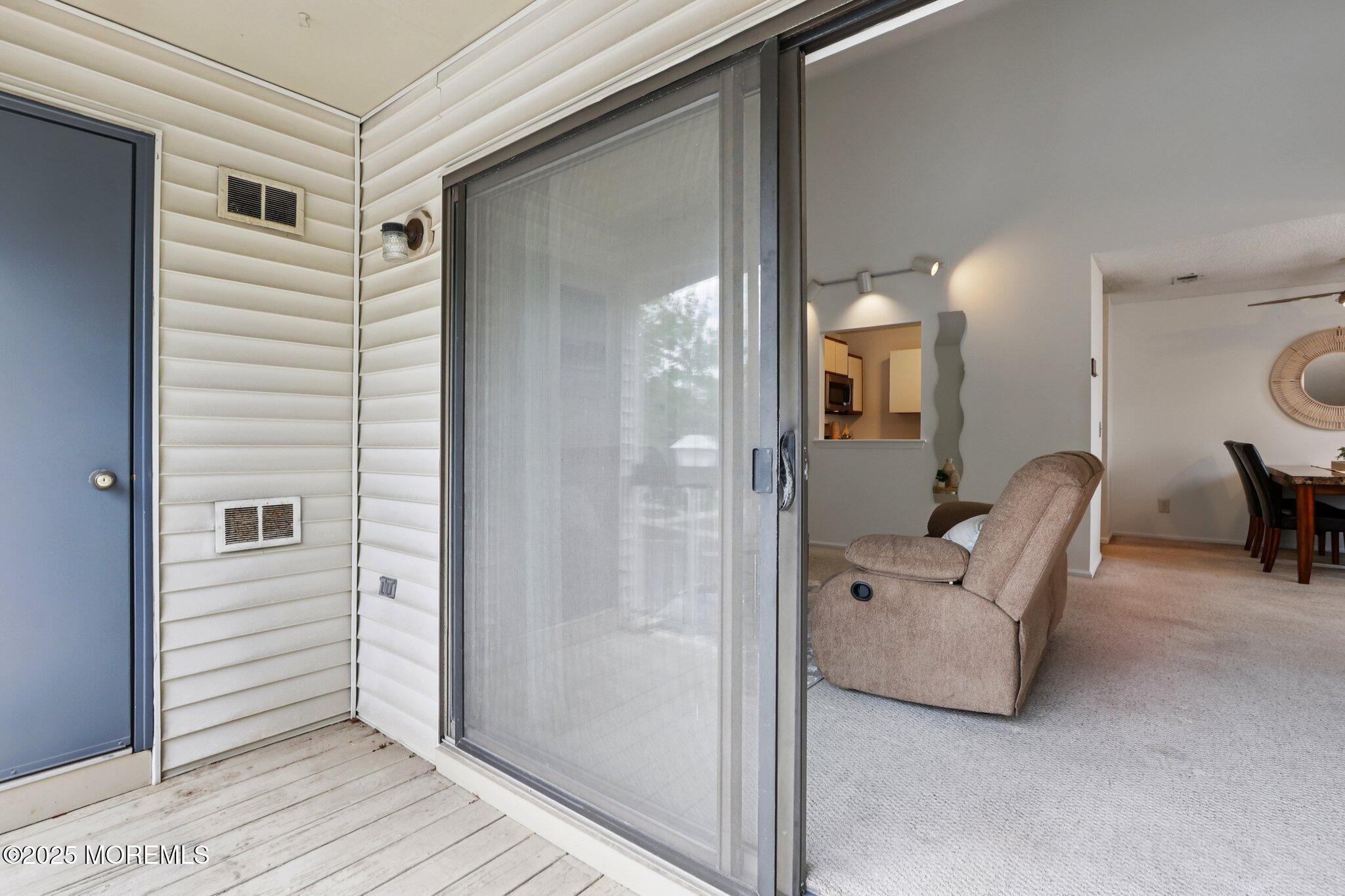3015 Lighthouse Lane, Unit 3015 Parlin, NJ 08859 - Photo 21 of 22 a view of a livingroom with furniture and windows