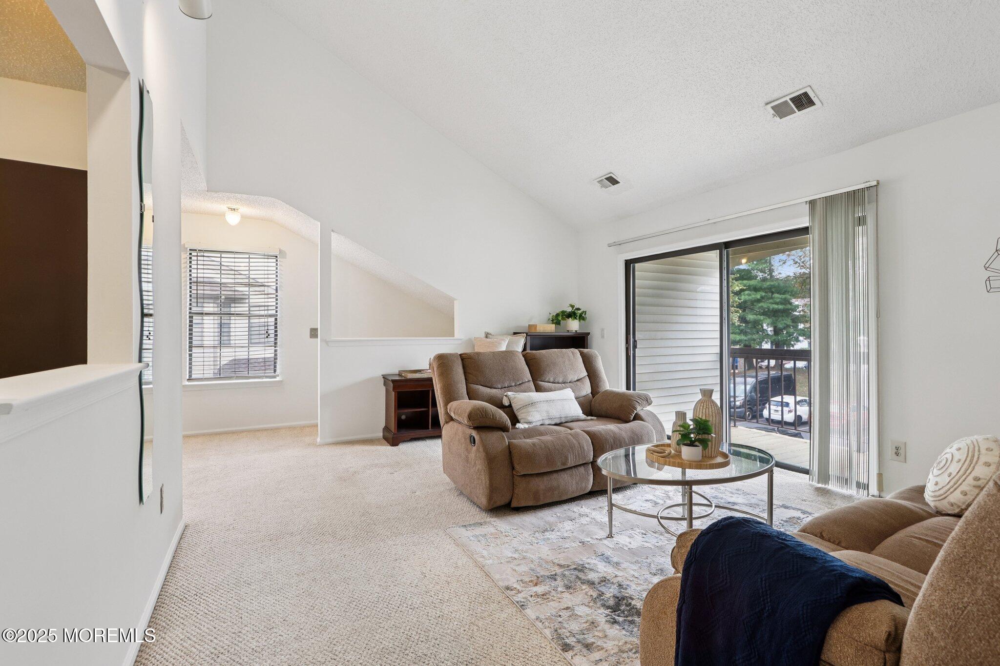 3015 Lighthouse Lane, Unit 3015 Parlin, NJ 08859 - Photo 3 of 22 a living room with furniture and a large window