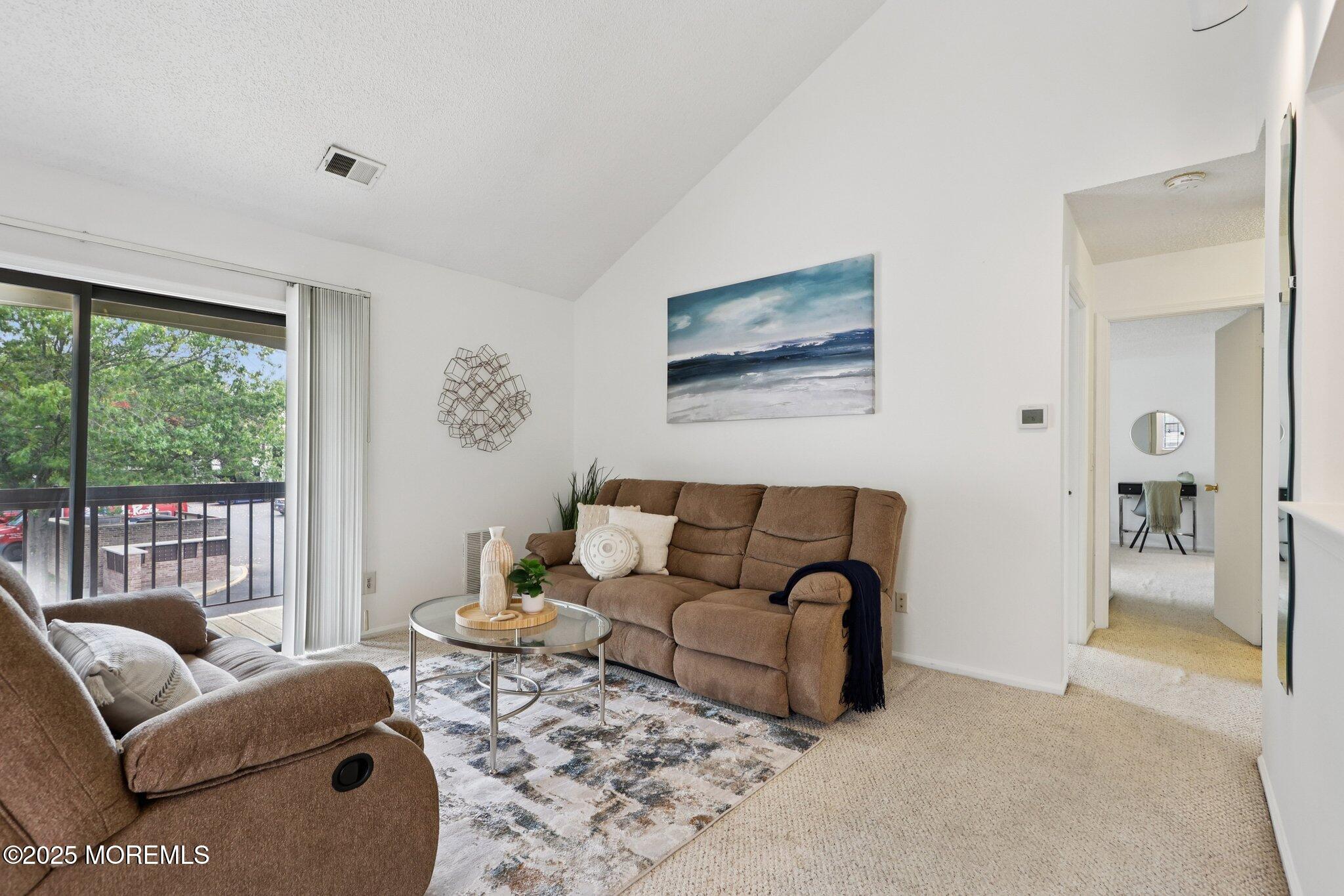 3015 Lighthouse Lane, Unit 3015 Parlin, NJ 08859 - Photo 4 of 22 a living room with furniture and a large window