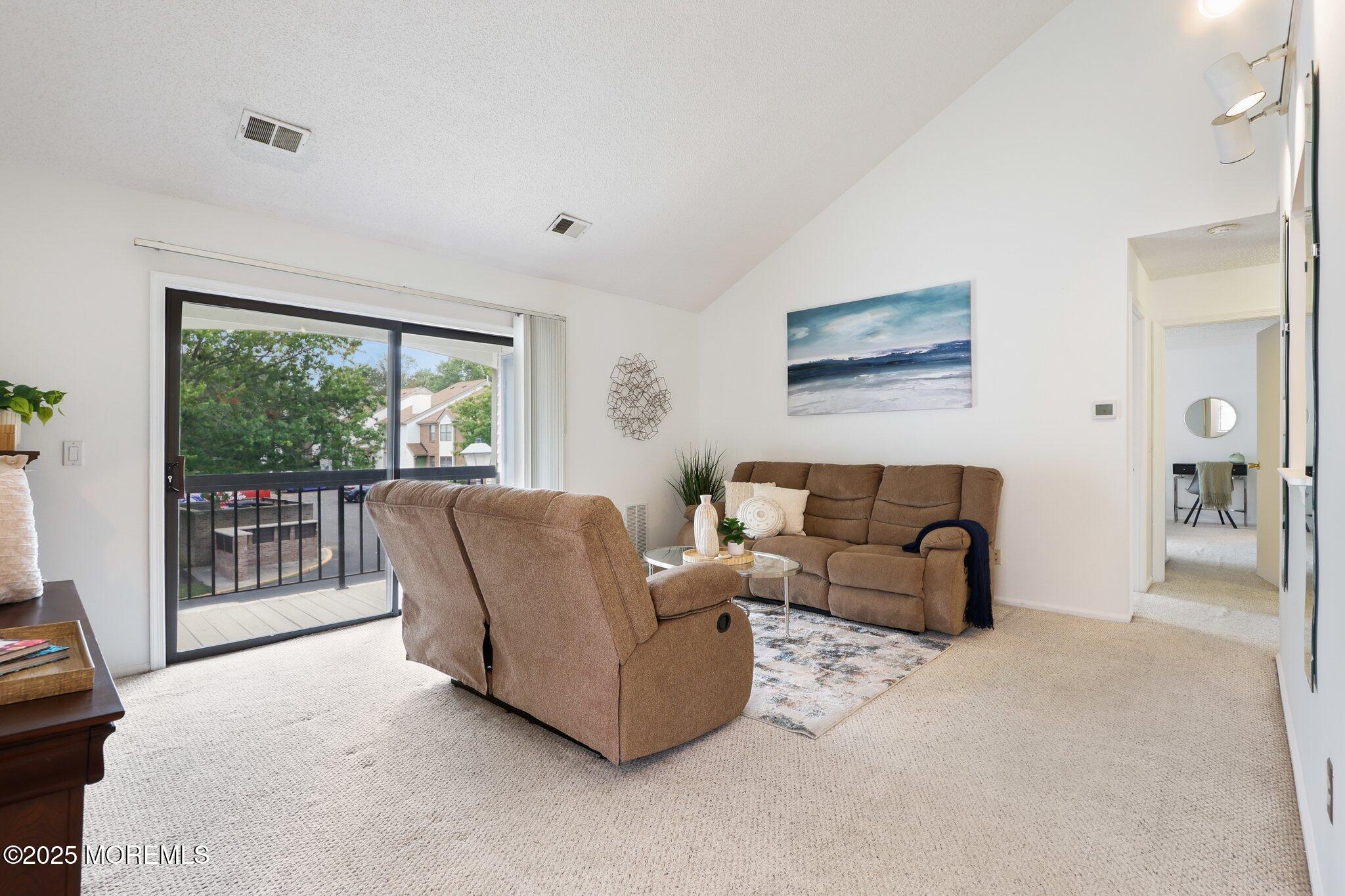 3015 Lighthouse Lane, Unit 3015 Parlin, NJ 08859 - Photo 7 of 22 a living room with furniture and a large window