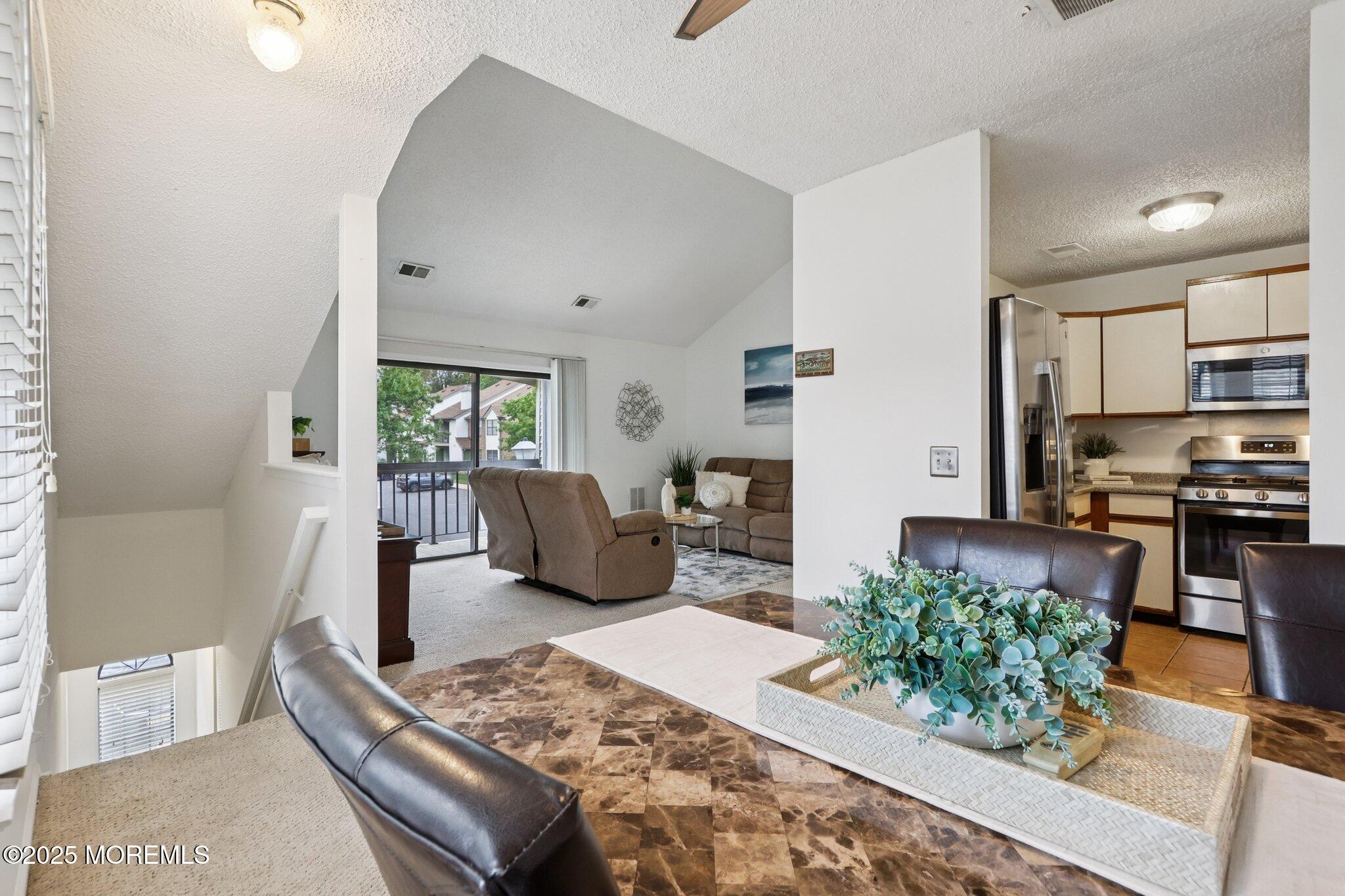 3015 Lighthouse Lane, Unit 3015 Parlin, NJ 08859 - Photo 10 of 22 a living room with furniture and a large window
