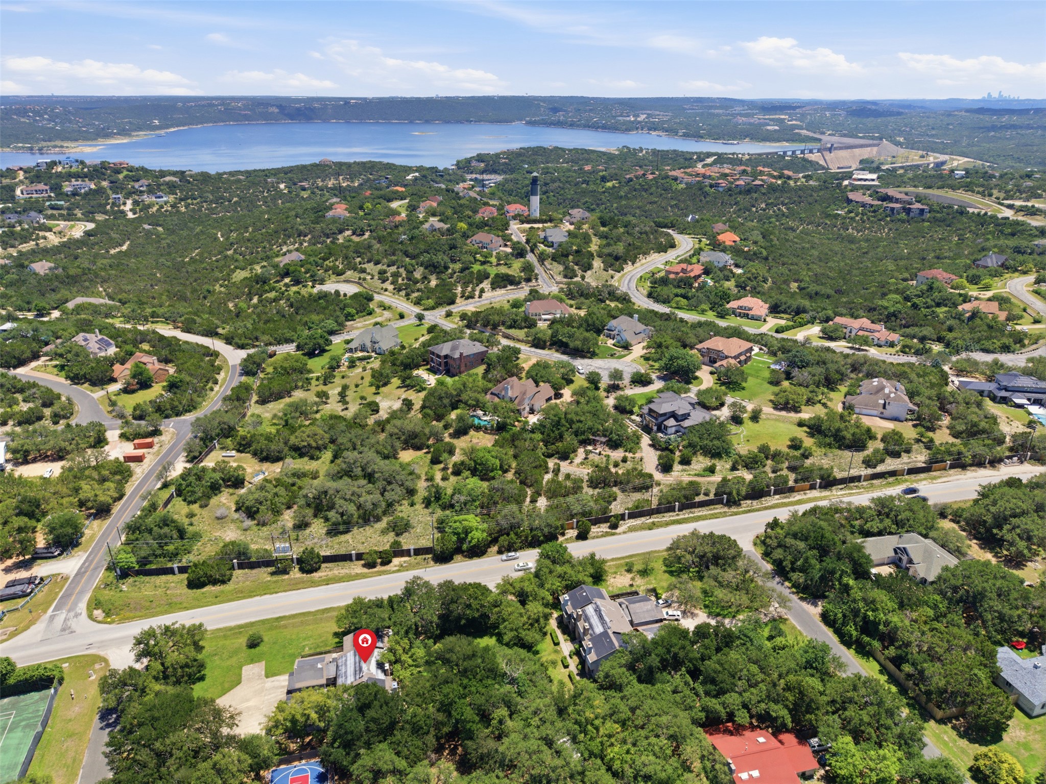 4204 Hudson Bend Road, Unit B Austin, TX 78734 - Photo 37 of 37 Expansive aerial perspective showcasing a residential community amidst abundant natural landscaping