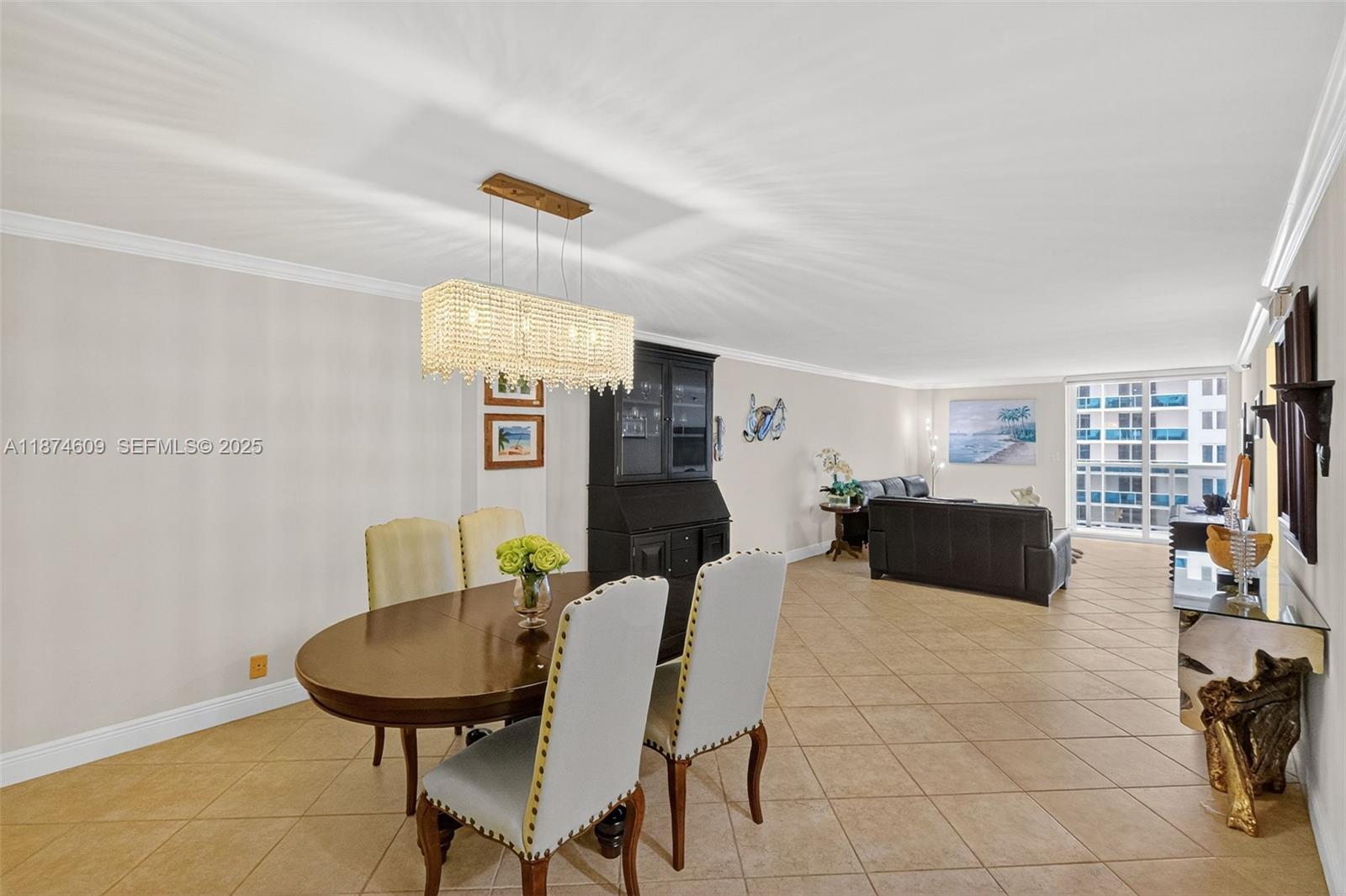 2401 Collins Avenue, Unit 1005 Miami Beach, FL 33140 - Photo 4 of 19 a living room with furniture and a wooden floor