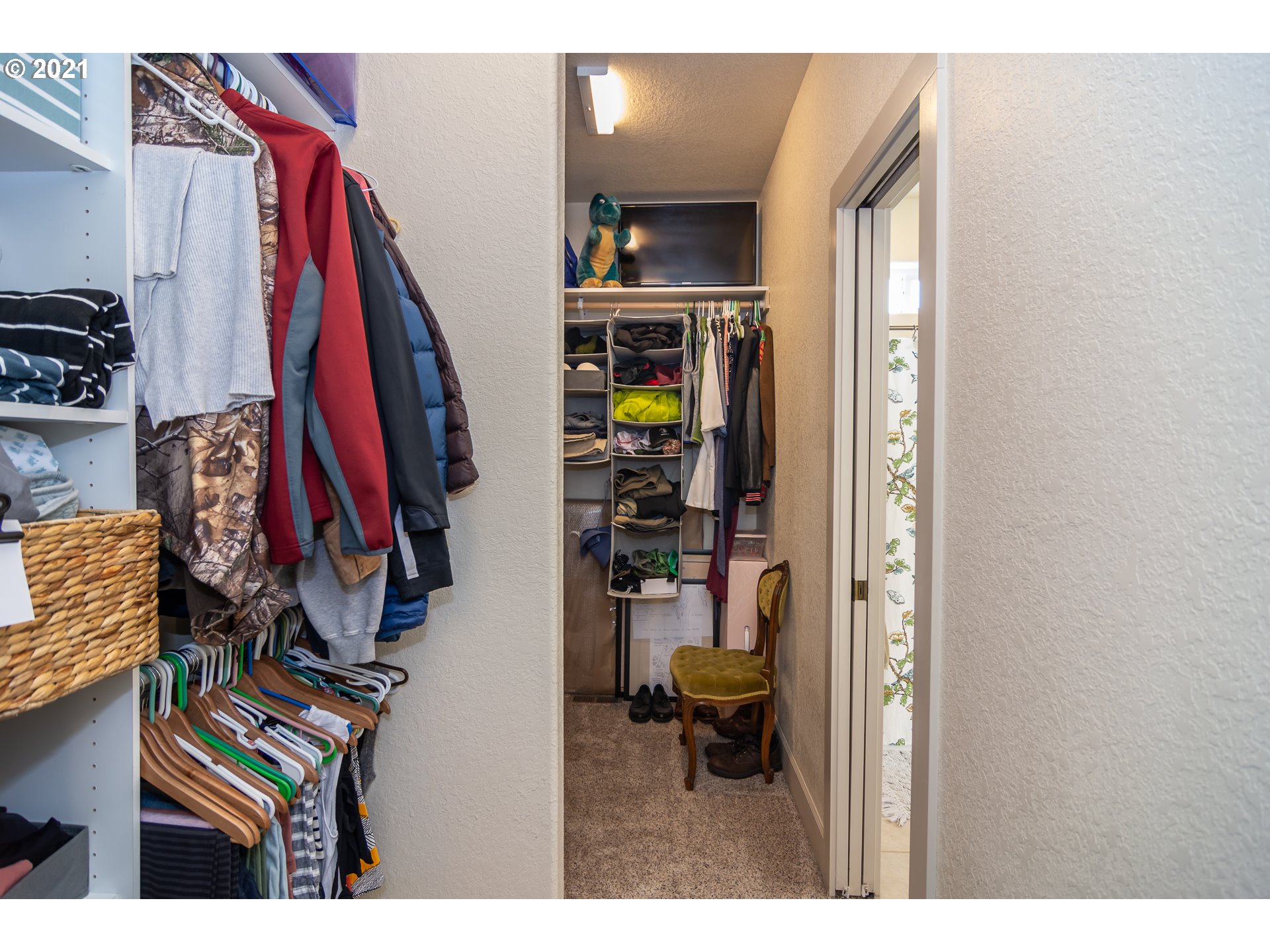 463 South 47th Street Springfield, OR 97478 - Photo 14 of 25 a view of walk in closet with clothes and shoes