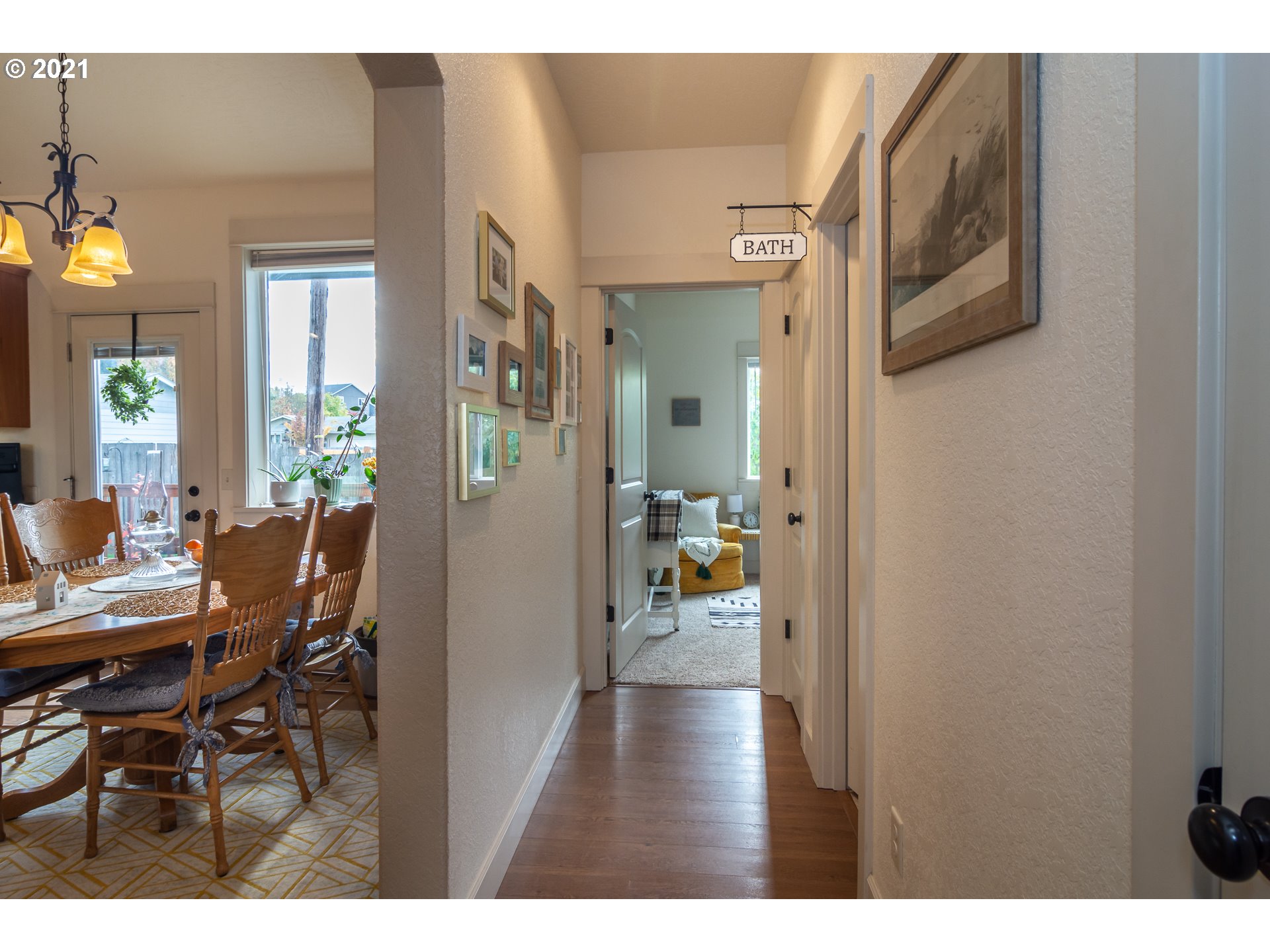 463 South 47th Street Springfield, OR 97478 - Photo 18 of 25 a view of a dining room with furniture and a chandelier