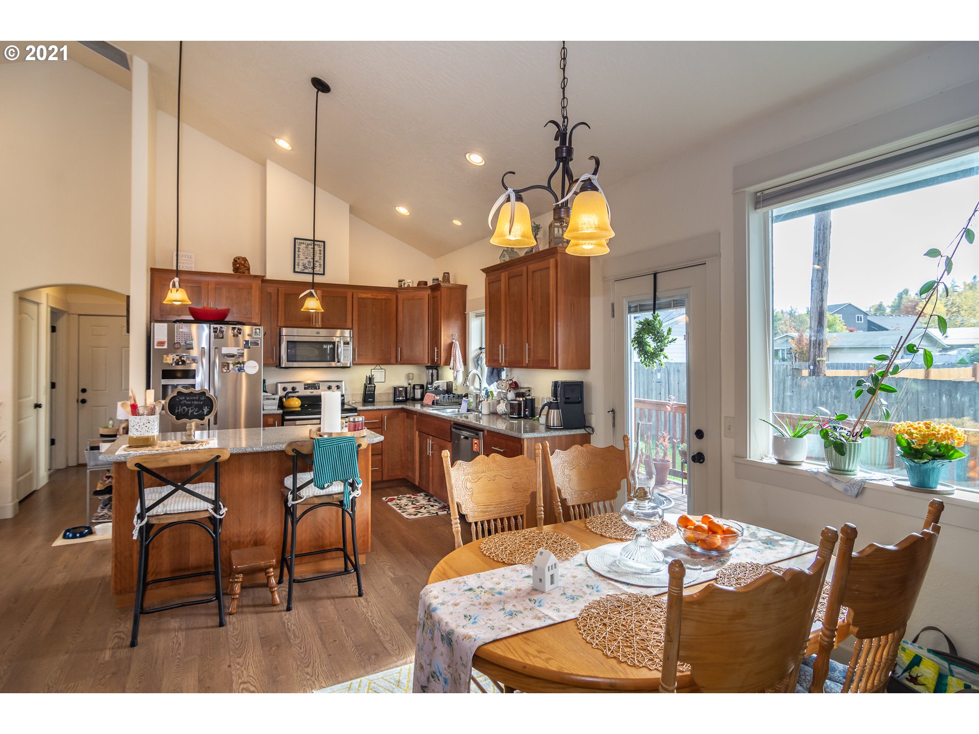 463 South 47th Street Springfield, OR 97478 - Photo 9 of 25 a living room with dining room and kitchen view