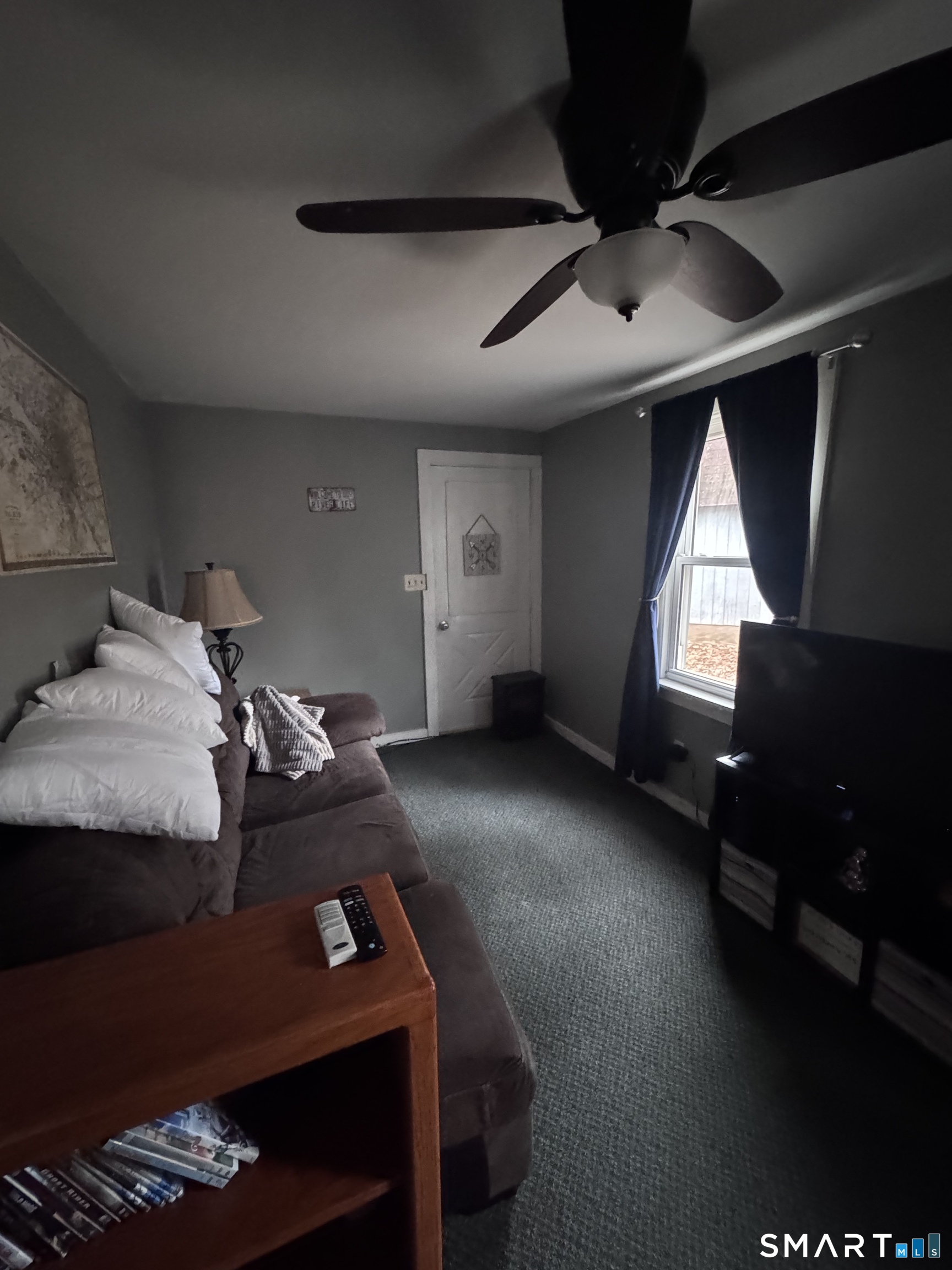 40 Flood Bridge Road Southbury, CT 06488 - Photo 11 of 15 a room with furniture and a window