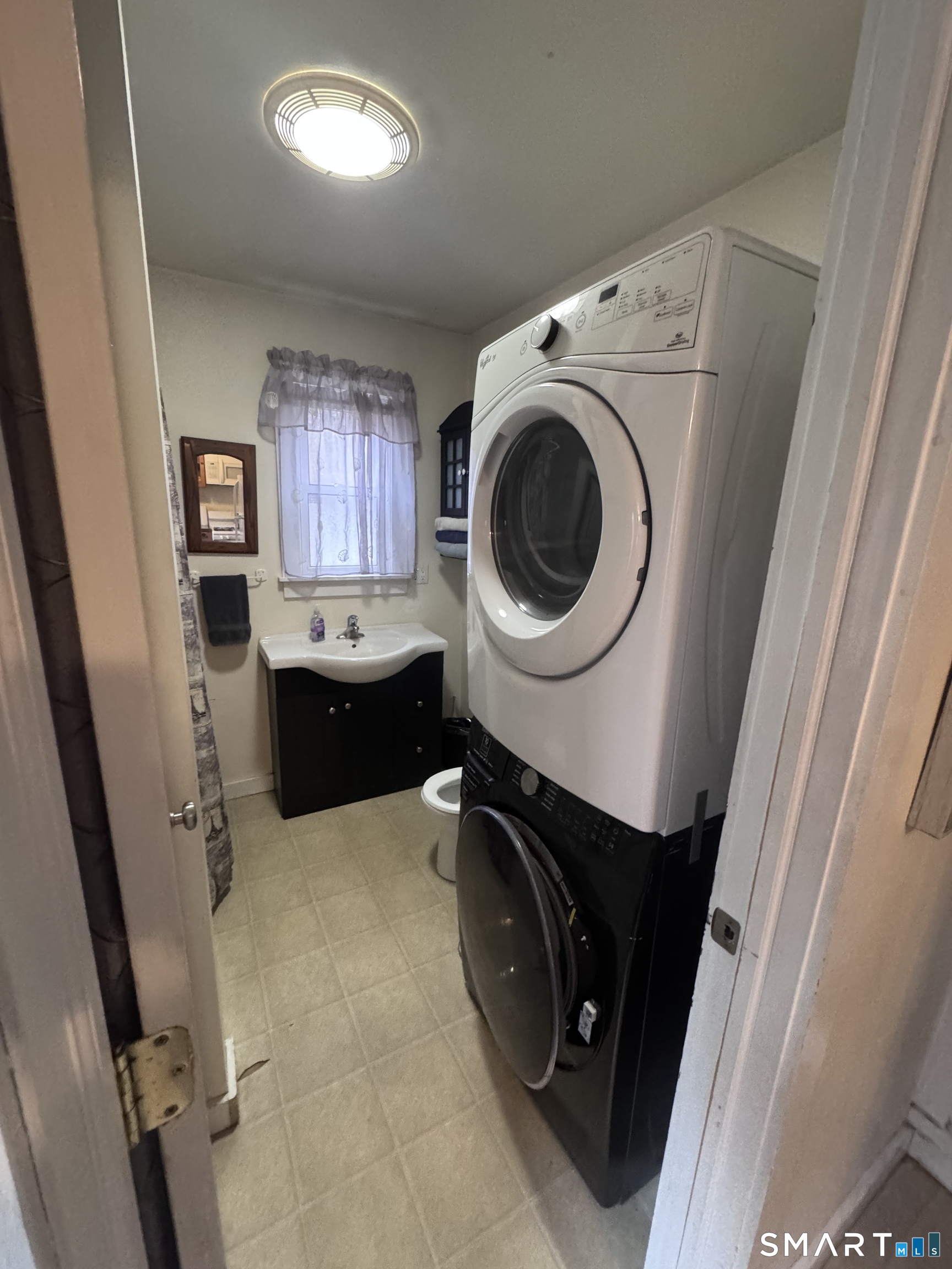 40 Flood Bridge Road Southbury, CT 06488 - Photo 7 of 15 a utility room with dryer and washer