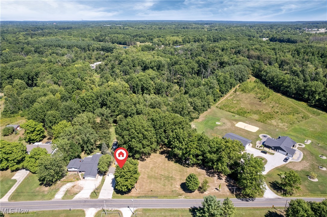 4320 Rootstown Road Rootstown, OH 44272 - Photo 29 of 32 Aerial overview of property's location featuring a heavily wooded area