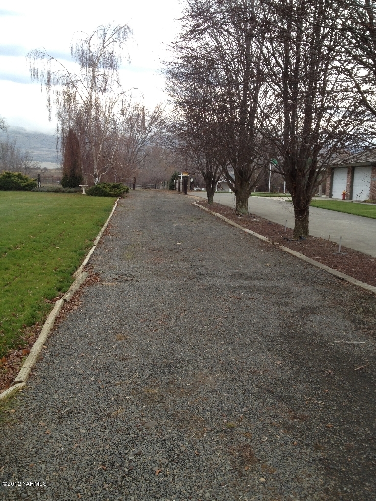 8004 Rutherford Road Yakima, WA 98903 - Photo 5 of 42 a view of road with tree