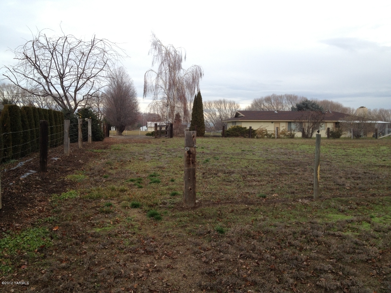 8004 Rutherford Road Yakima, WA 98903 - Photo 8 of 42 a view of a field with a big yard