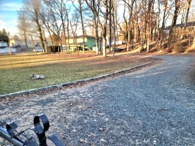 906 Center Street Scotch Plains, NJ 07076 - Photo 10 of 11 a view of a yard and front of a house