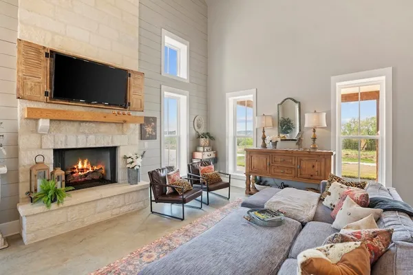 a kitchen with granite countertop a sink and a stove