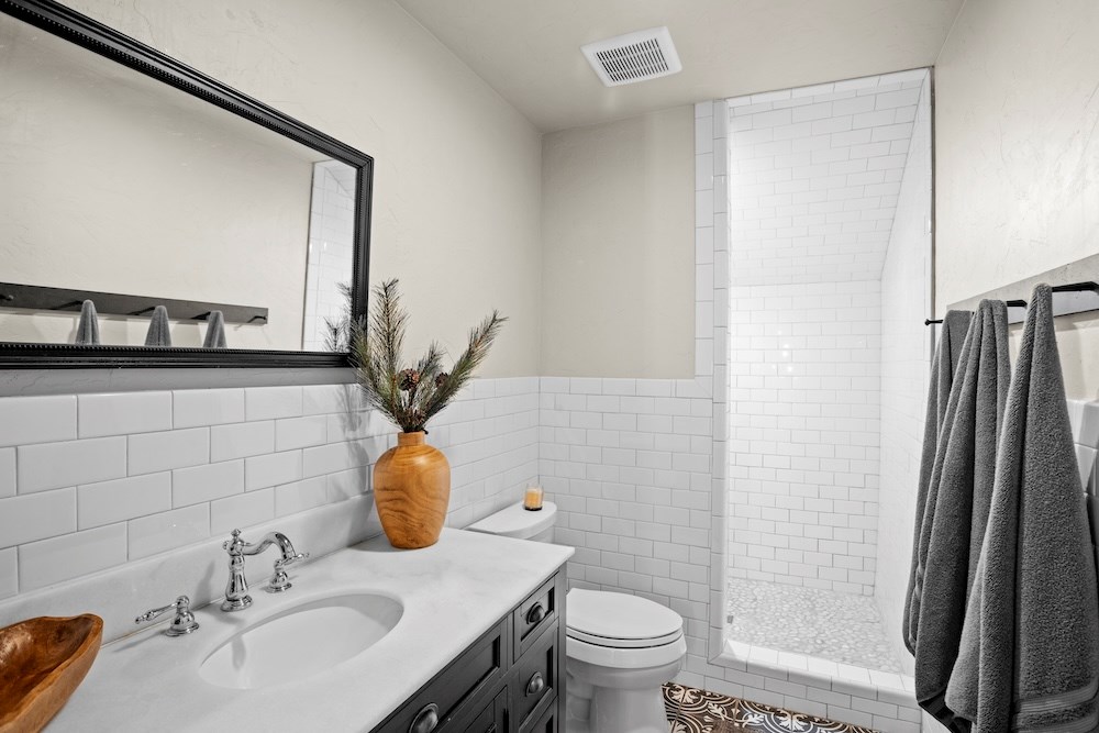 792 Langes Mill Road Doss, TX 78618 - Photo 59 of 76 a bathroom with a sink toilet and shower