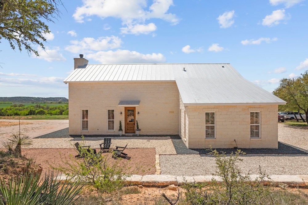 792 Langes Mill Road Doss, TX 78618 - Photo 64 of 76 a front view of a house with a yard
