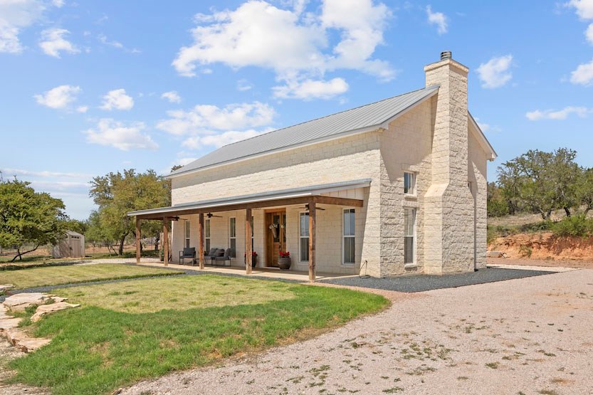 792 Langes Mill Road Doss, TX 78618 - Photo 7 of 76 a view of a house with a backyard and porch