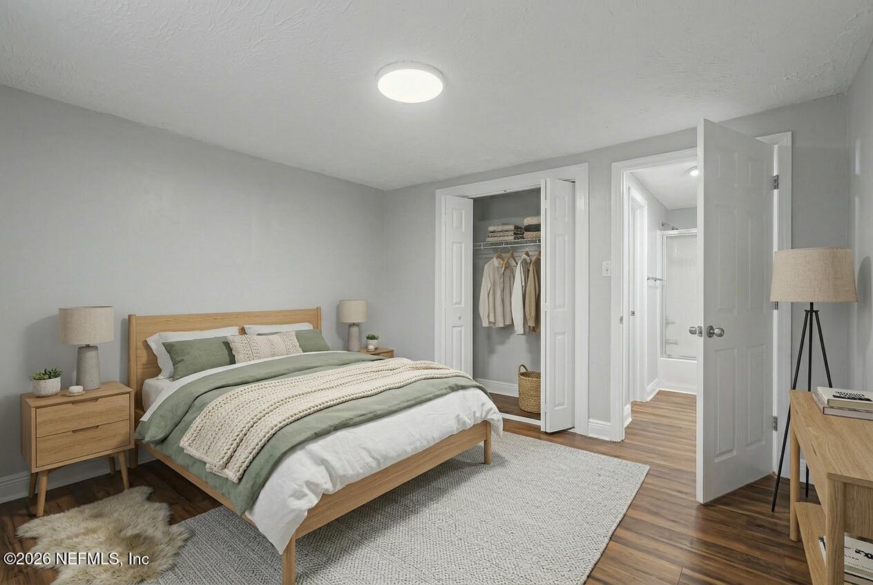 2625 Kohn Road Jacksonville, FL 32210 - Photo 17 of 34 a bedroom with a bed and a mirror