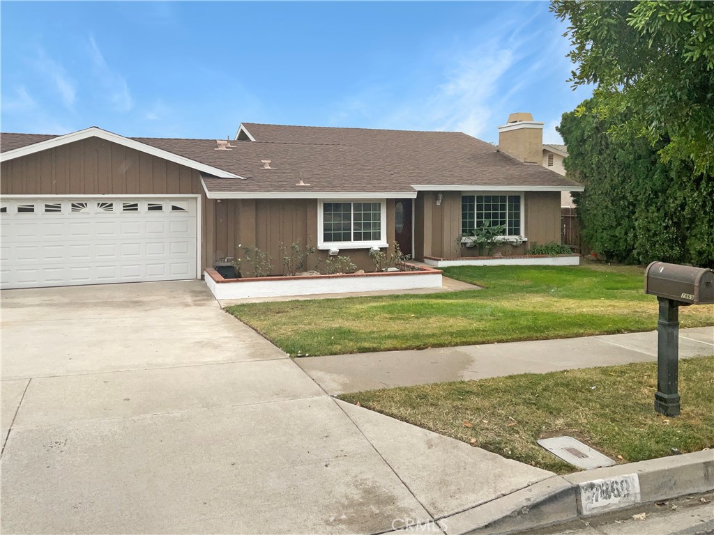 7869 Winery Ridge Drive Rancho Cucamonga, CA 91730 - Photo 1 of 1 a front view of a house with garden