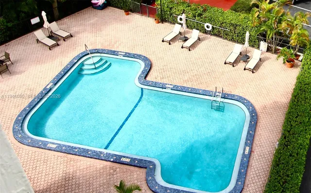 an aerial view of a swimming pool