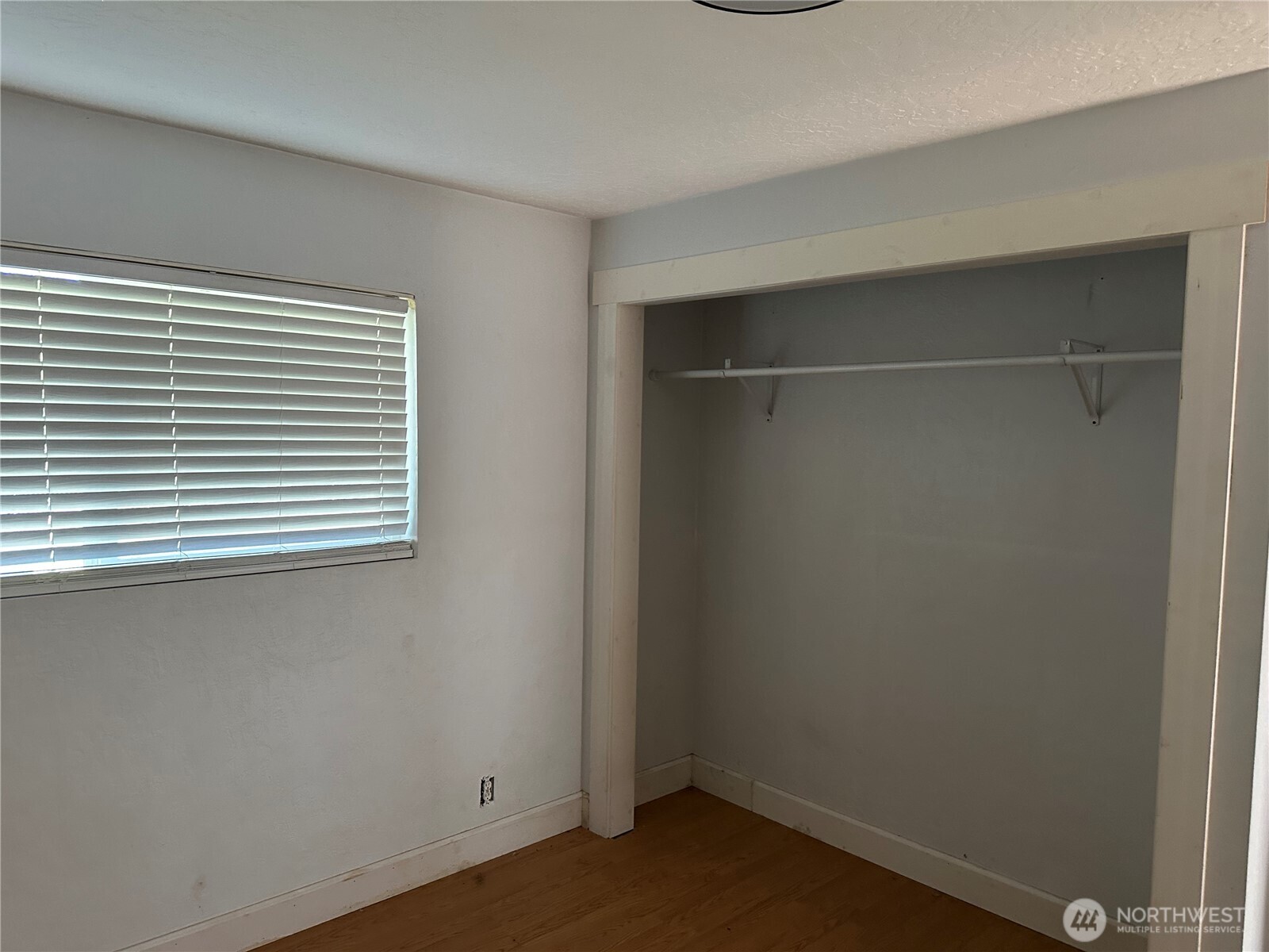 206 West Cushing Street Aberdeen, WA 98520 - Photo 11 of 25 a view of an empty room with a window