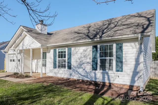 a house view with a garden space